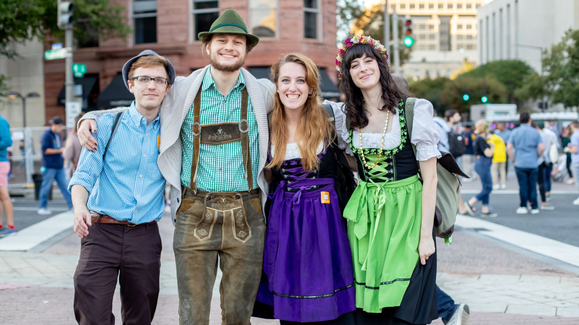 A group of four people dressed for Oktoberfest 