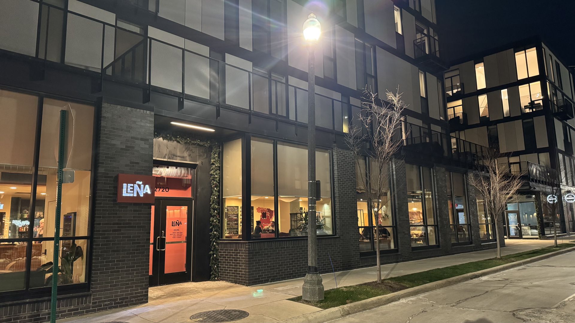 Lena's building is shown from the front. 