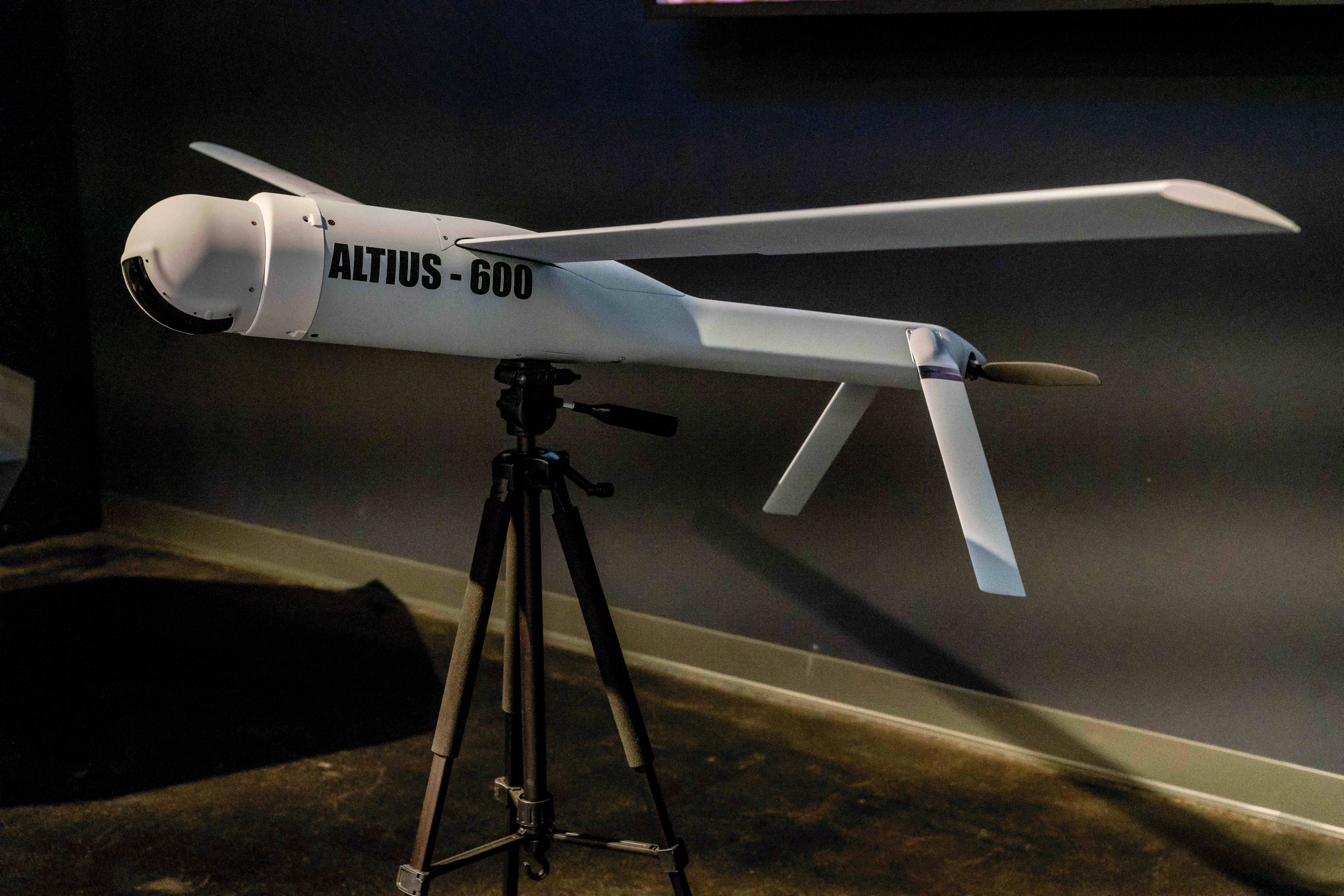 An unmanned aerial vehicle is placed on display. 