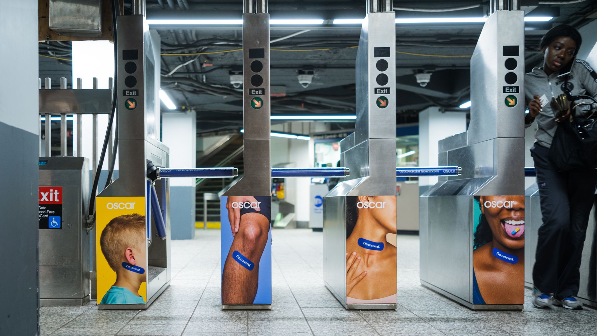 Ads for Oscar health insurance in New York's subway.