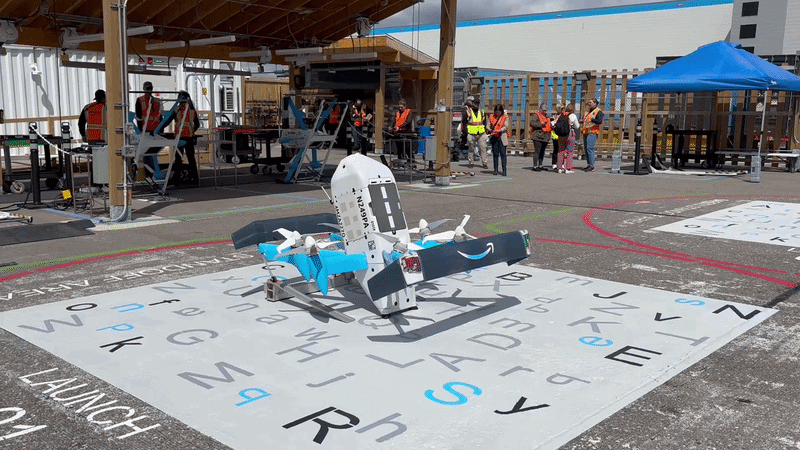 An Amazon Prime Air drone takes off from the company's Pontiac fulfillment center.