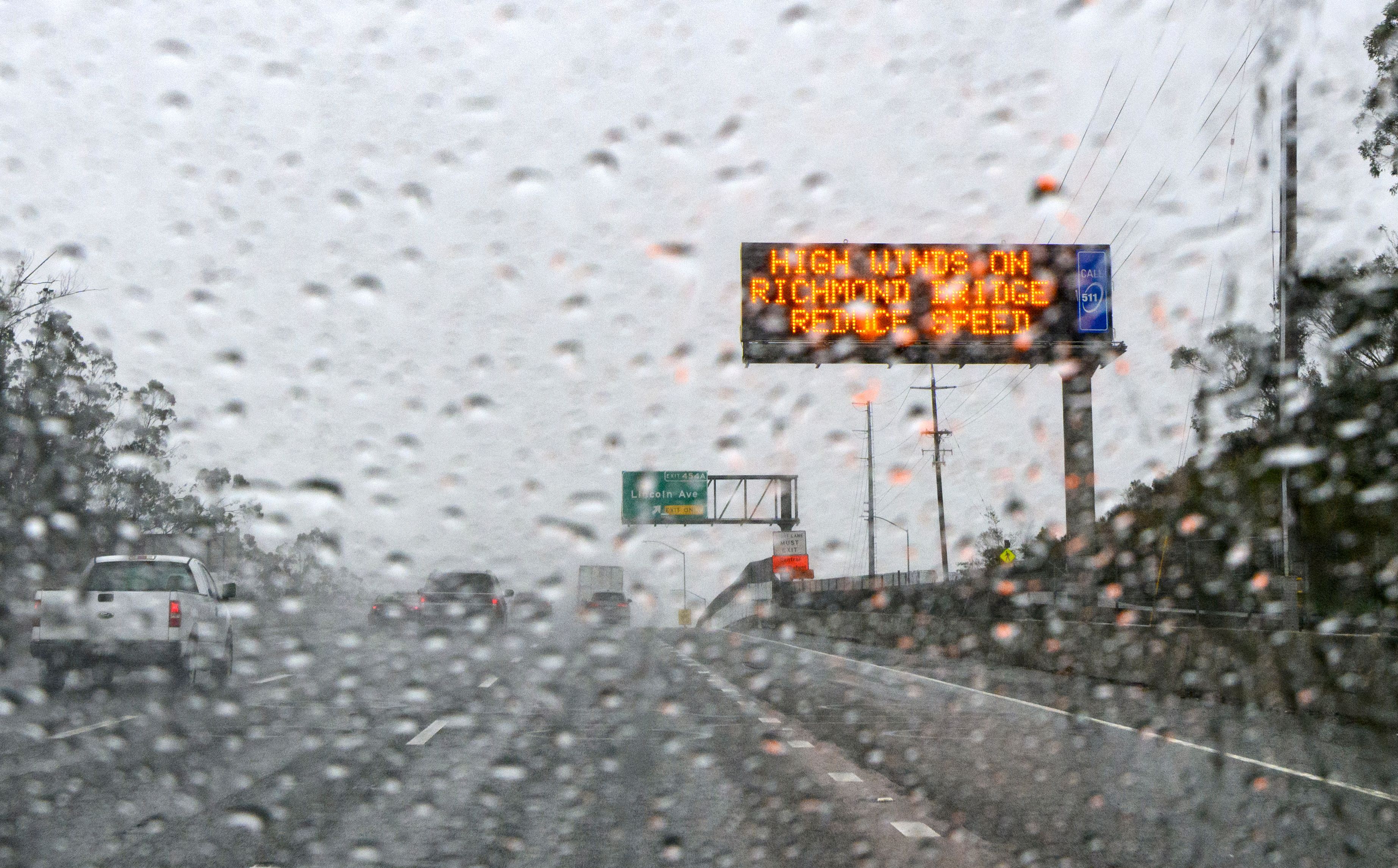 A traffic sign warns of inclement weather in San Rafael, California, on January 04.