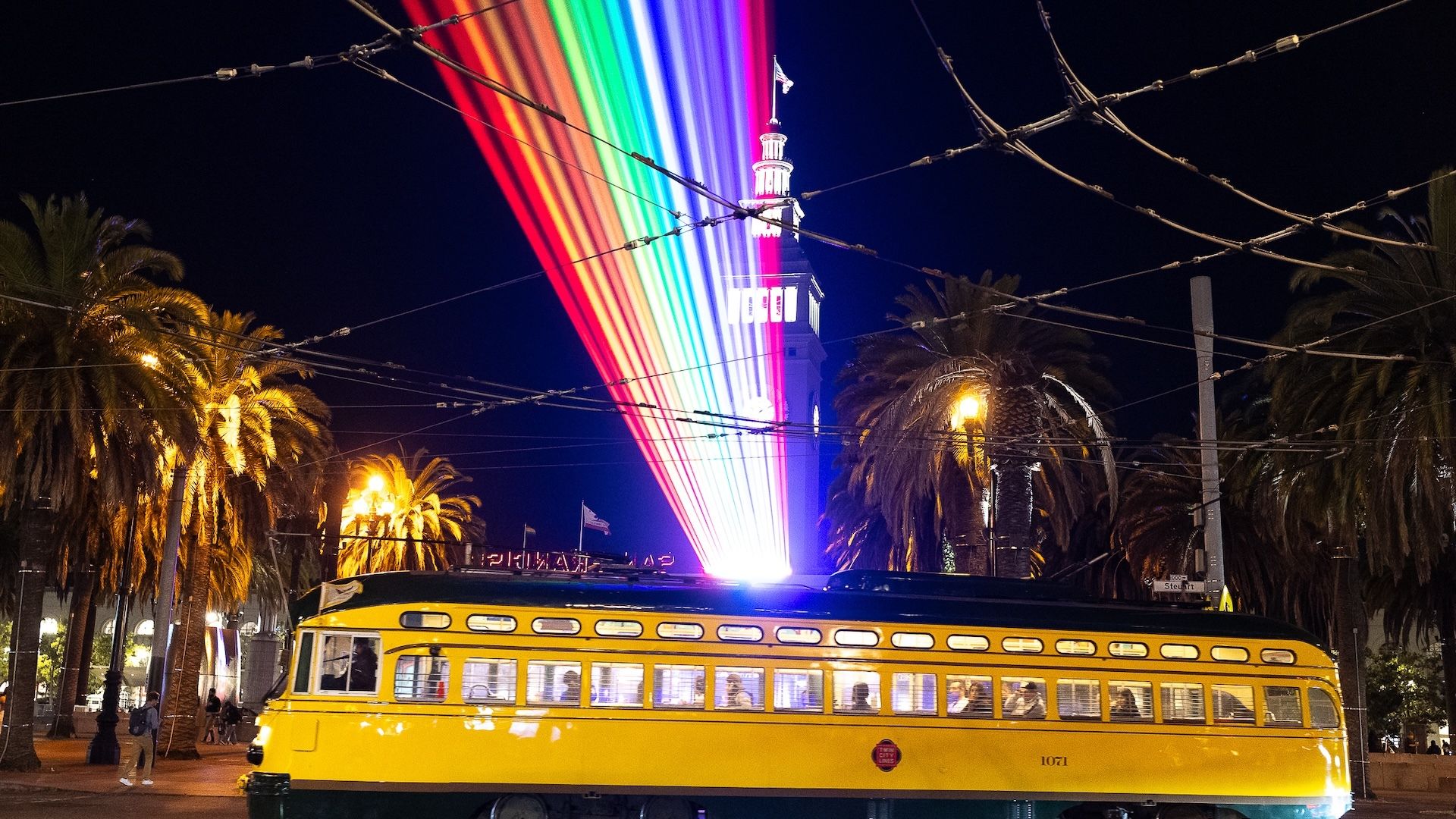 The "Welcome" laser light show shines out from the Ferry Building in 2024. Photo: Illuminate San Francisco