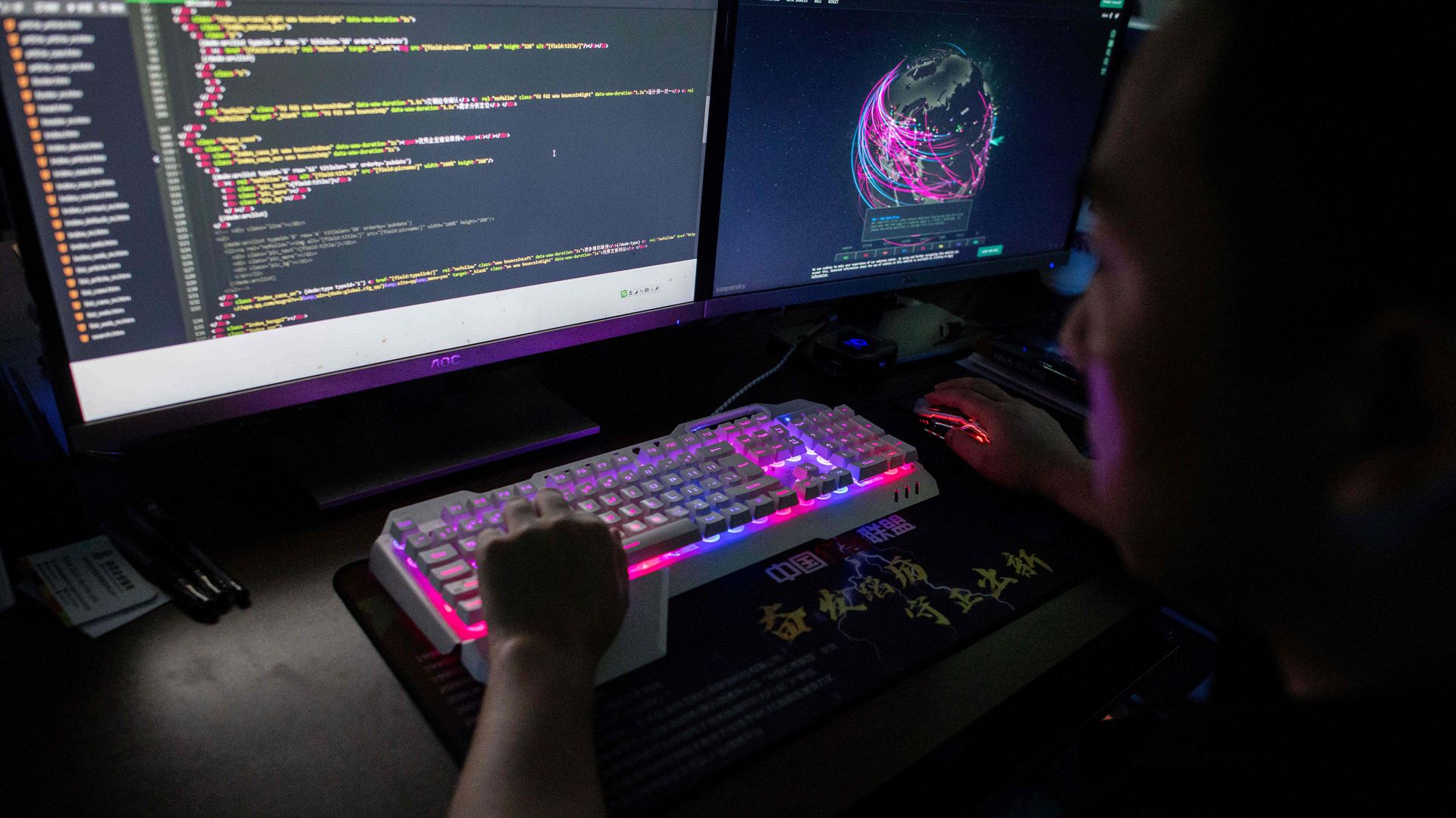 A member of the Red Hacker Alliance using a website that monitors global cyberattacks on his computer  in Dongguan, China's southern Guangdong province, in August 2020..