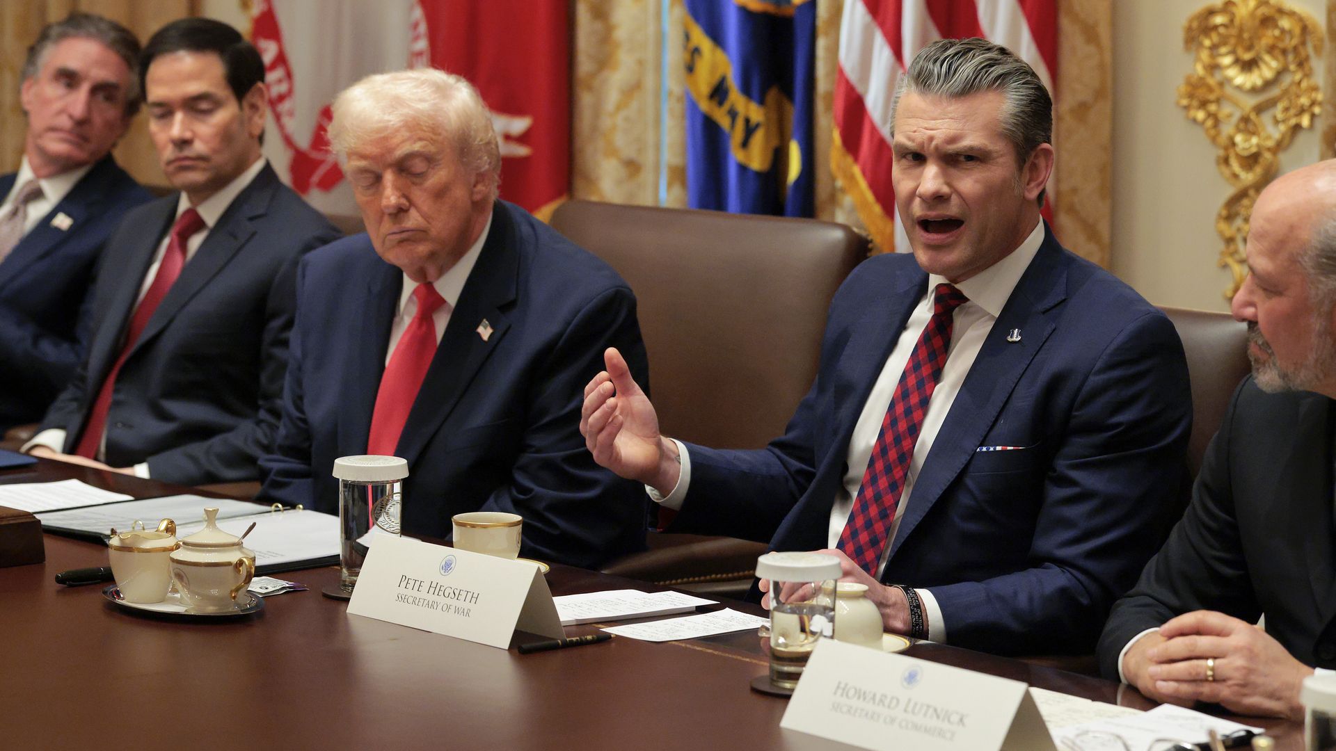 U.S. Secretary of War Pete Hegseth (2nd-R) speaks alongside (L-R) U.S. Interior Secretary Doug Burgum, U.S. Secretary of State Marco Rubio, U.S. President Donald Trump and U.S. Secretary of Commerce Howard Lutnick during a Cabinet meeting in the Cabinet Room of the White House on December 02, 2025