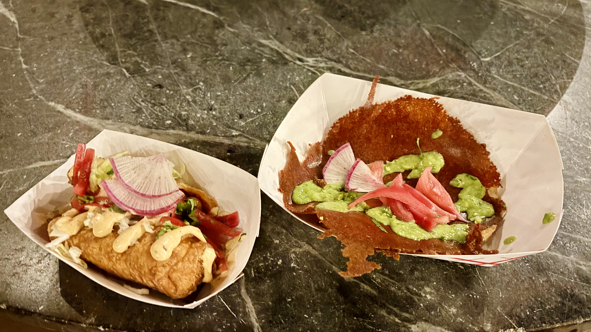 Special menu items from Tacos Oscar are pictured.