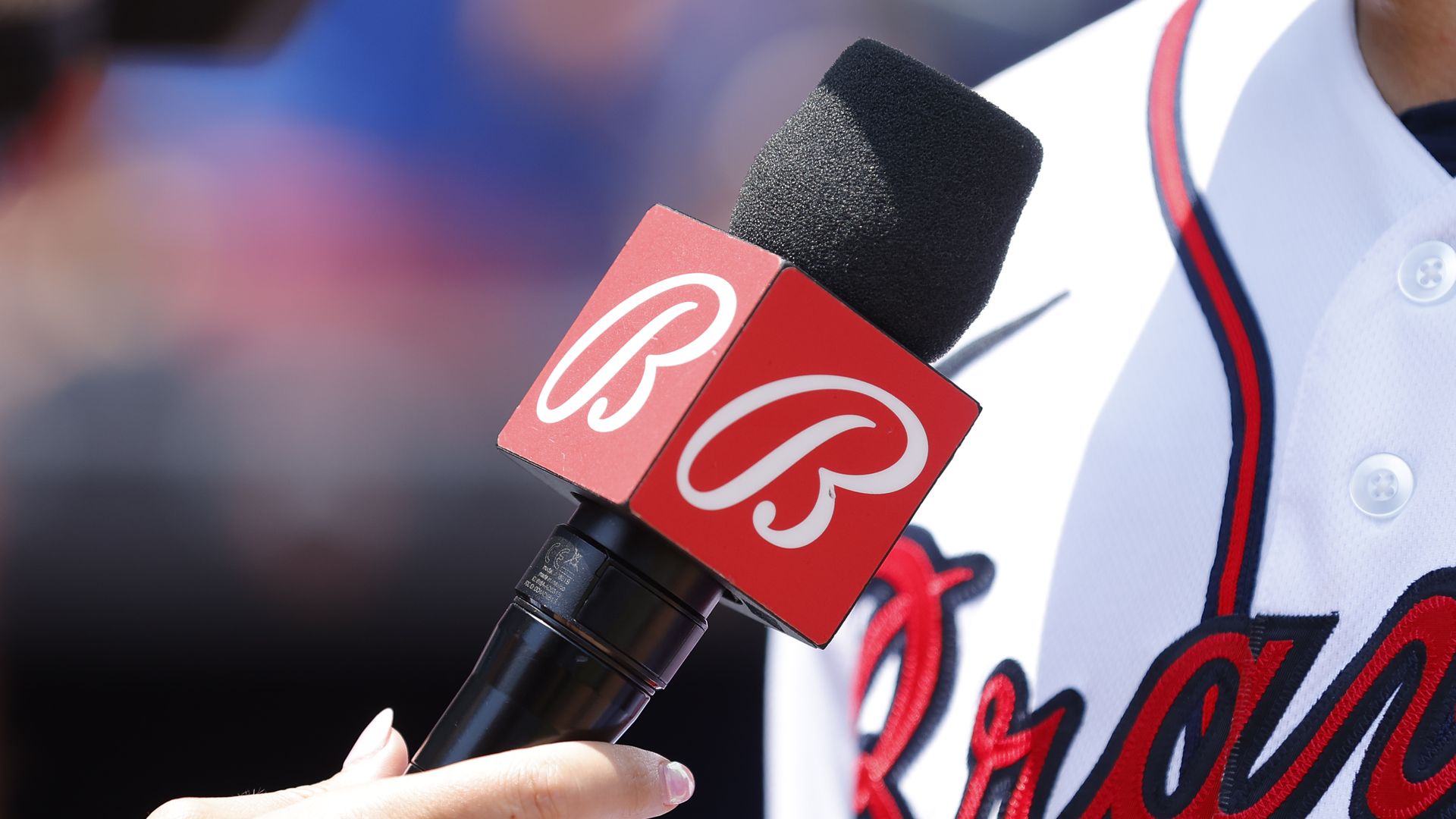 A microphone with the Bally logo