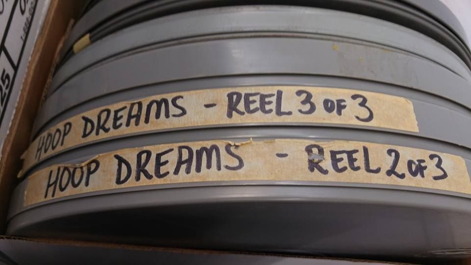 Photo of film reels with the words "Hoop Dreams Reel 2 of 3" 