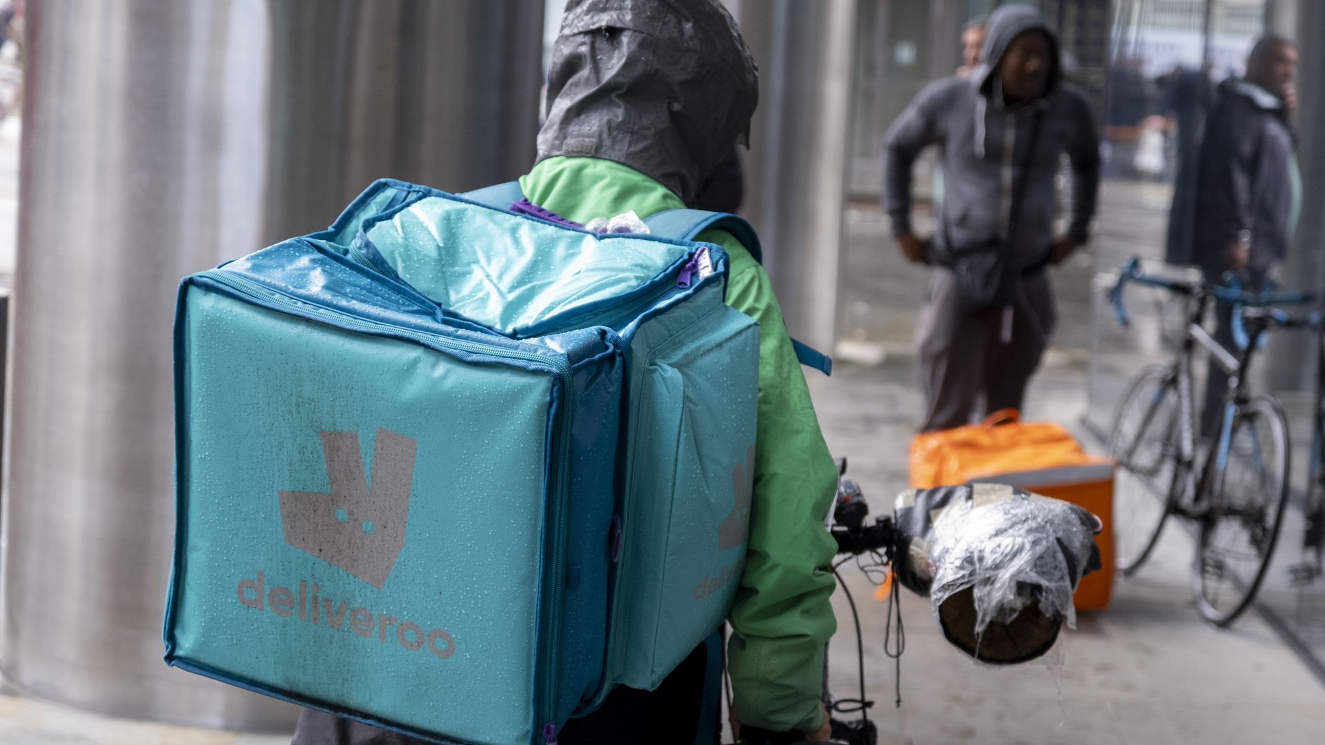 A Deliveroo takeaway delivery person in the UK.