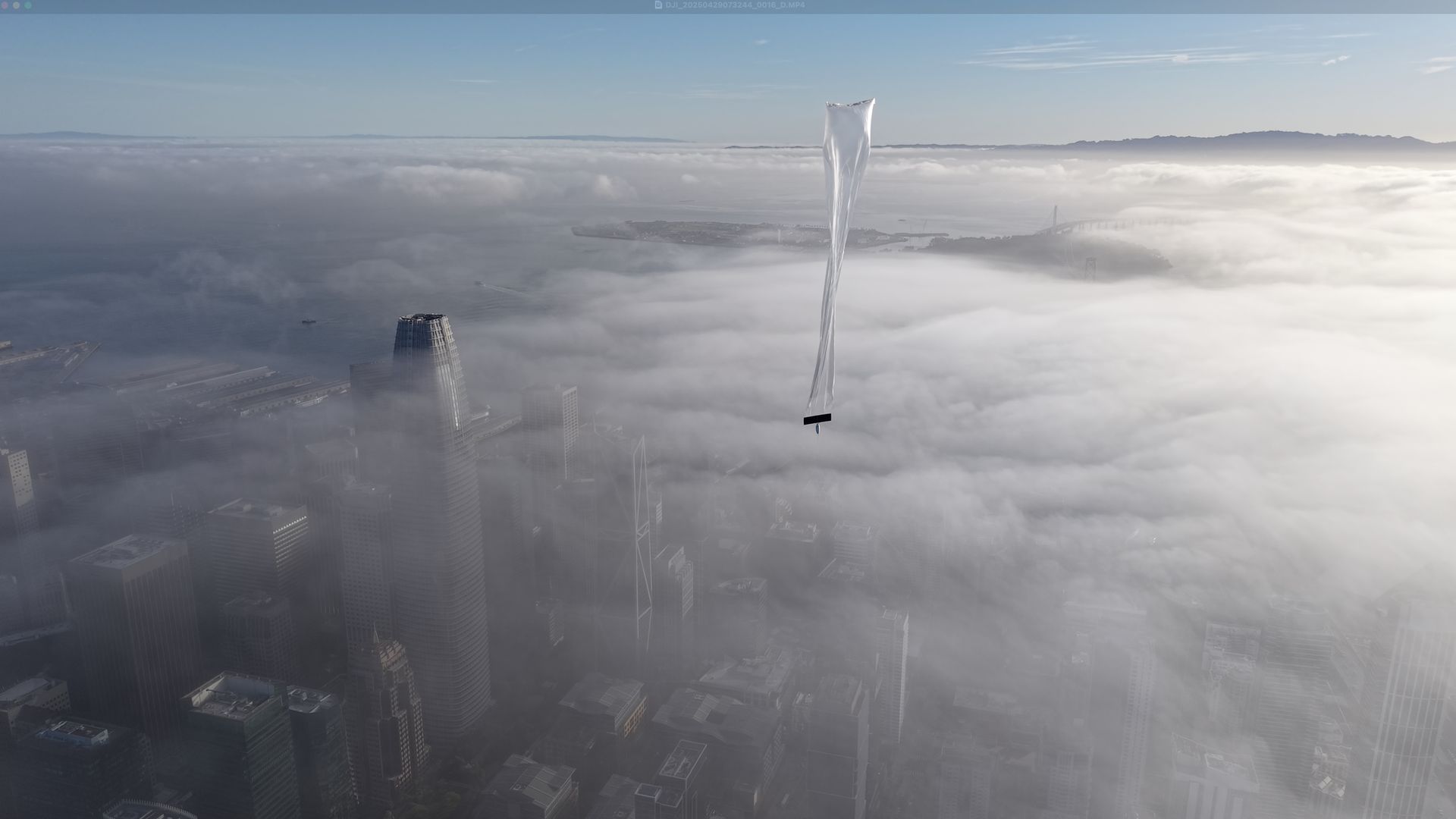 A weather balloon floating above San Francisco made by the startup Sorcerer
