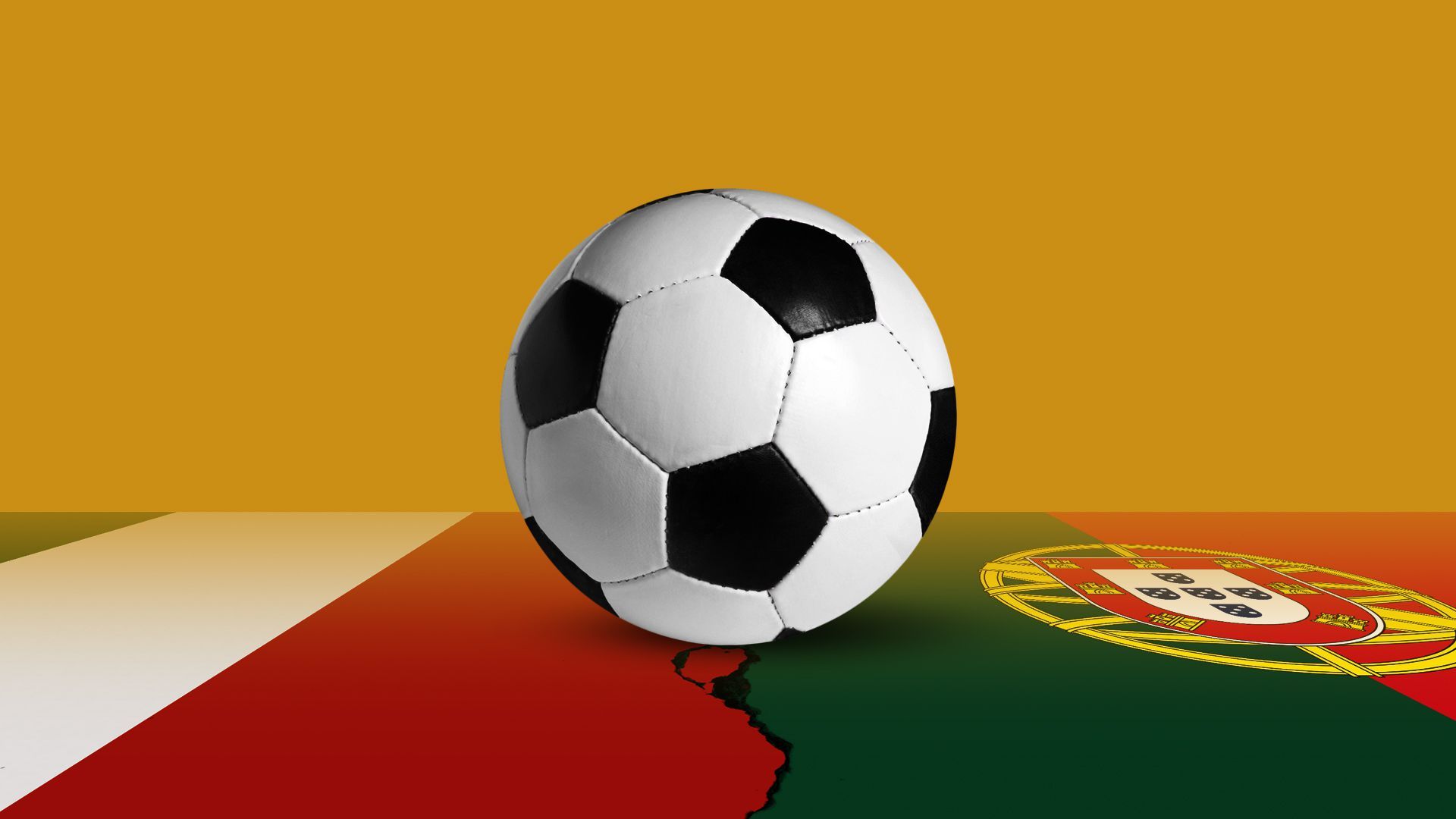 A soccer ball banced on the crack between the flags for Italy and Portugal. 