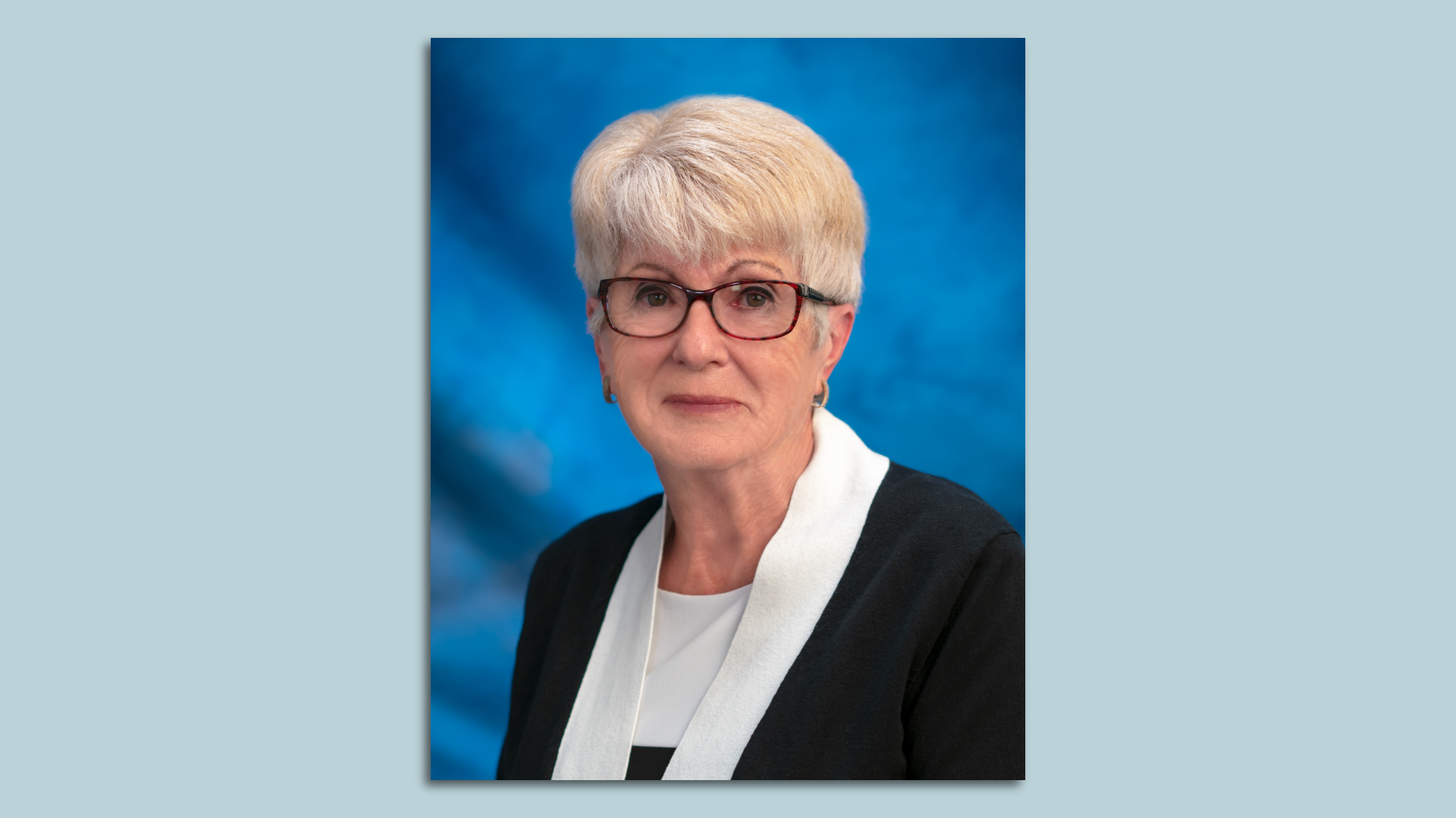 A headshot of a woman.