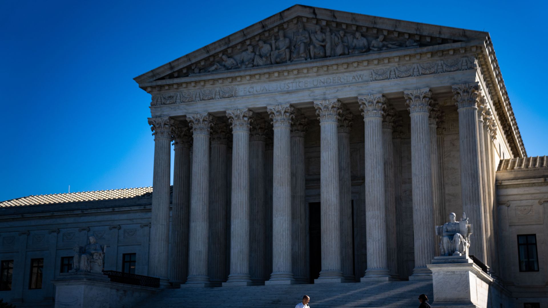 Demonstrators with PETA gather outside the Supreme Court of the United States.