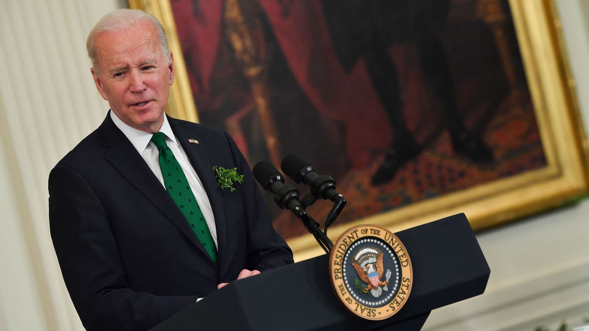 President Biden is seen in a green tie during a St. Patrick's Day event at the White House.