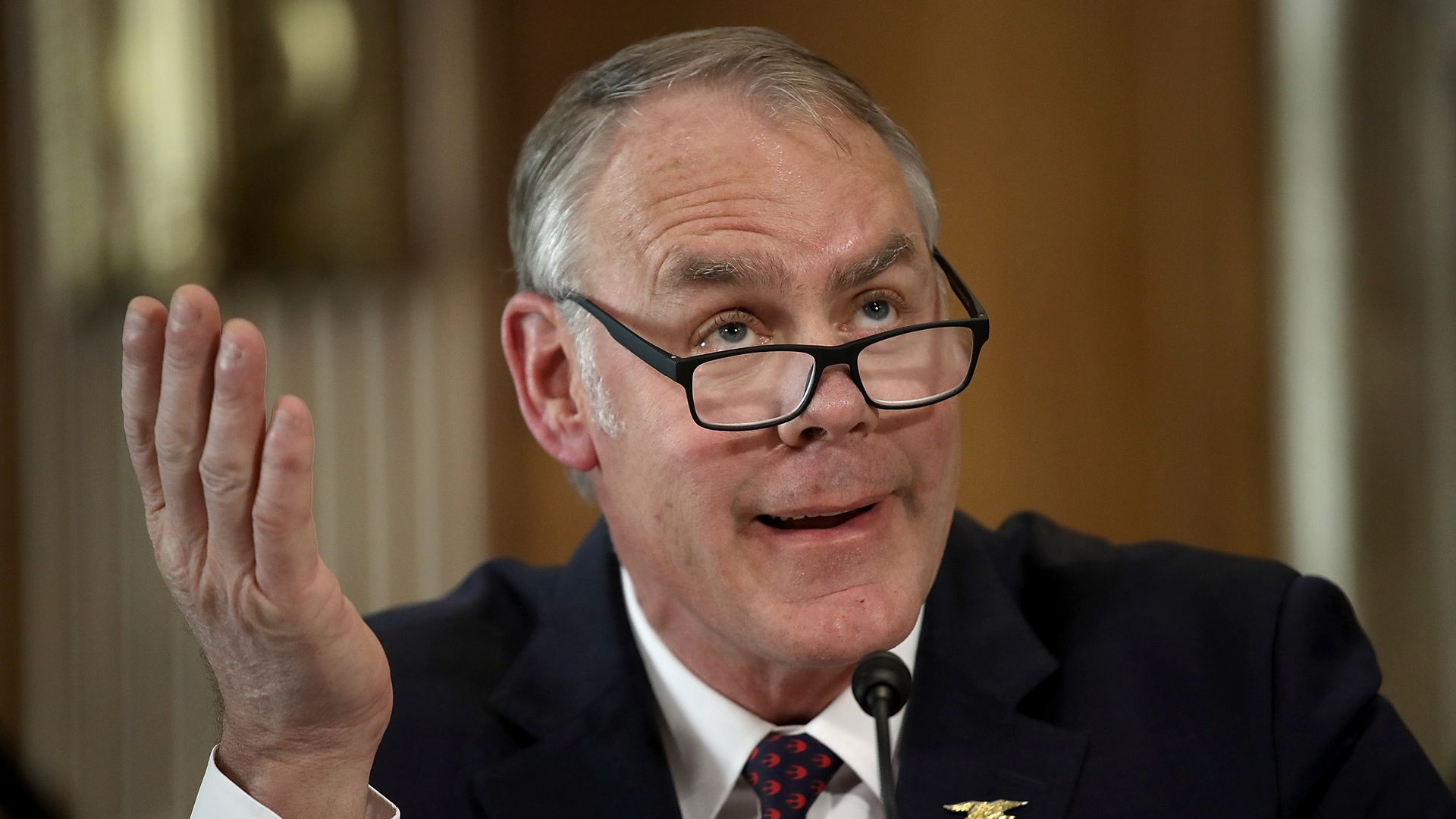 Ryan Zinke throws hand in air in apparent disbelief