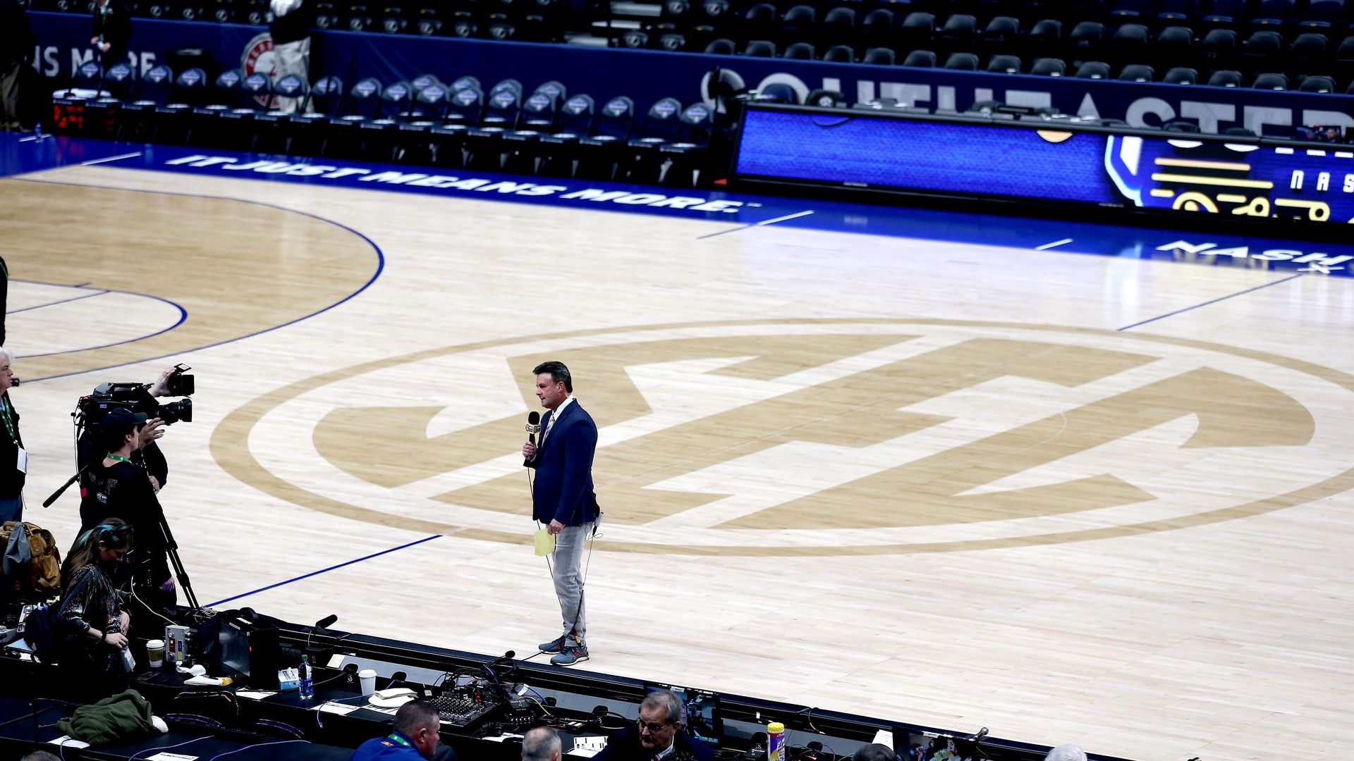 Reporter on empty court