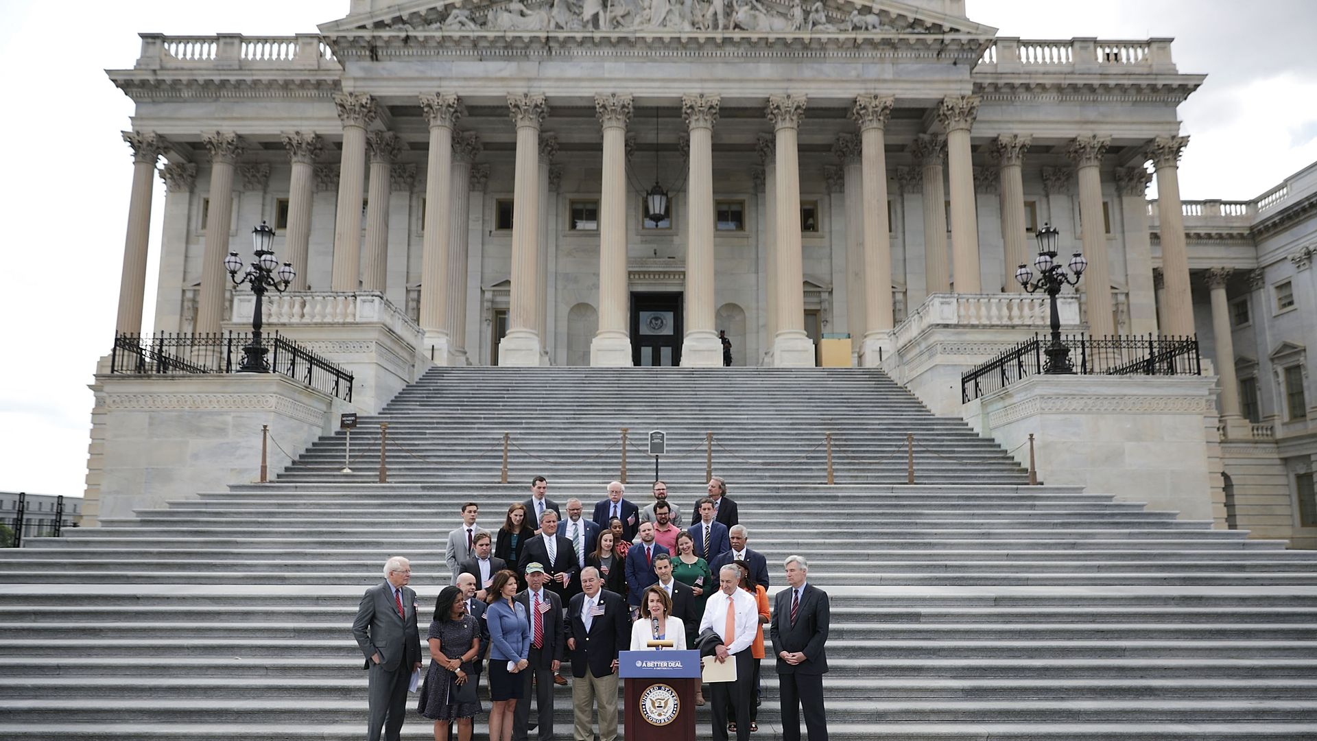House and Senate Democratic leadership in front of the Capitol.
