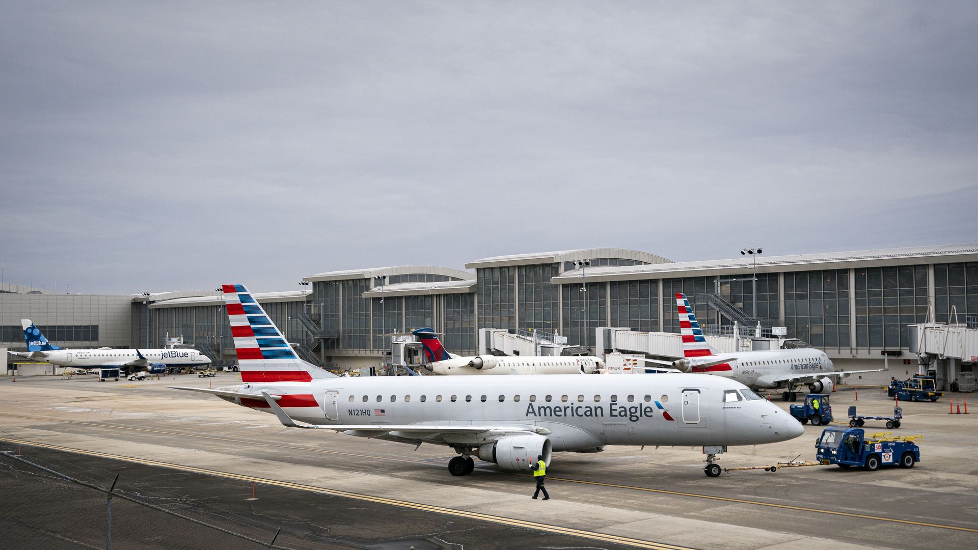 An American Airlines plane is taxied out from a gate at Raleigh-Durham International Airport.