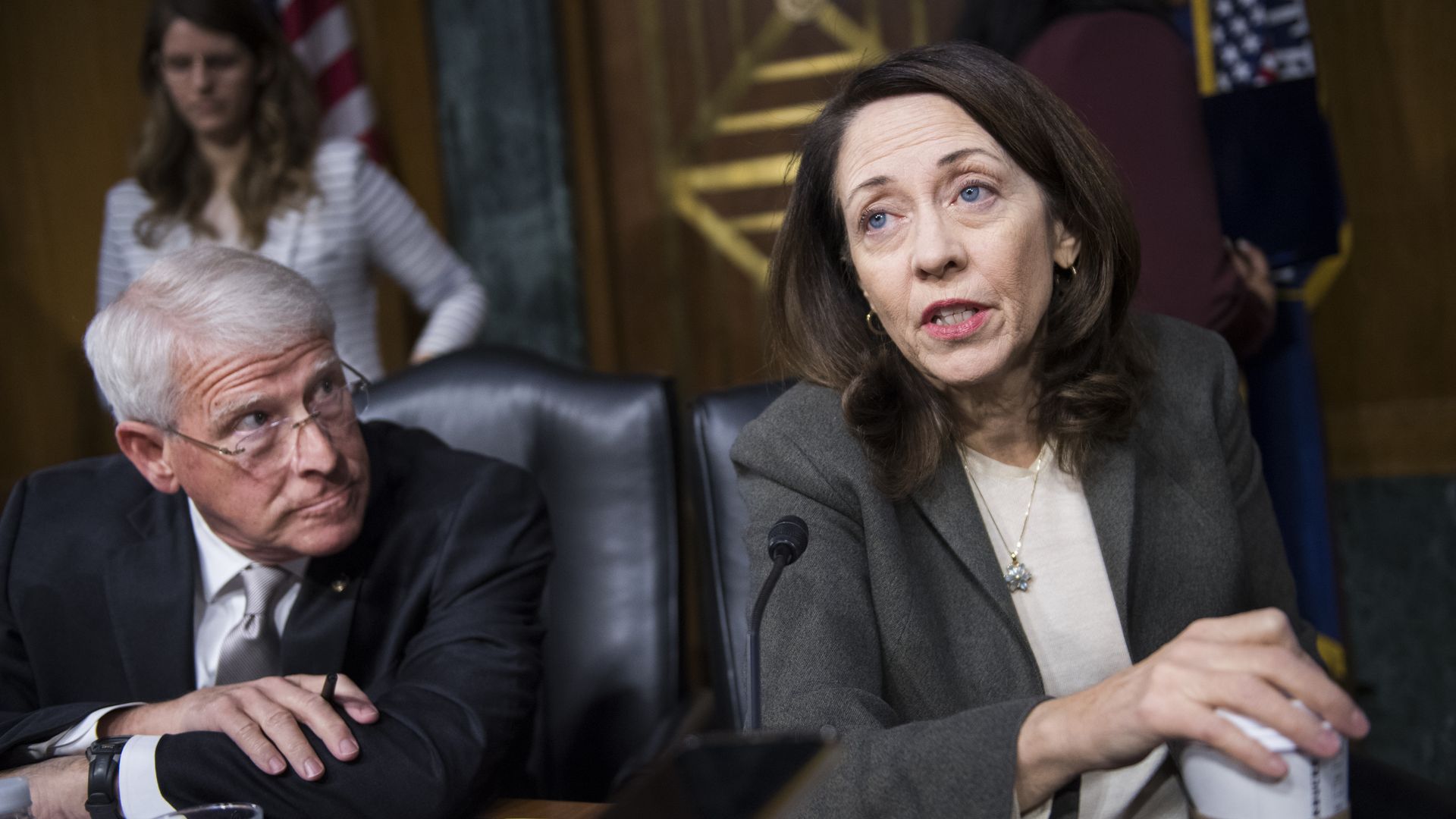 A man and a woman sitting next to each other