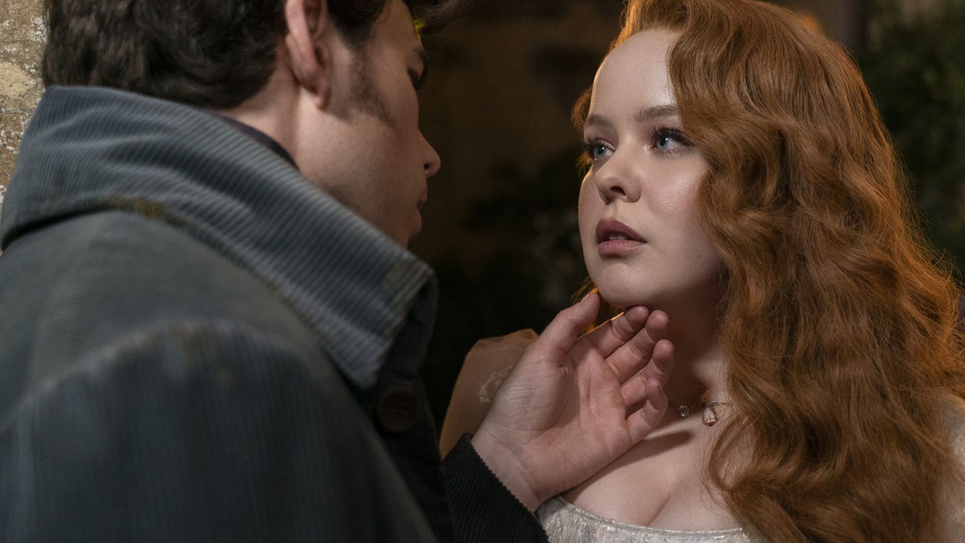 Actors Luke Newton and Nicola Coughlan in season 3 of the TV show "Bridgerton."