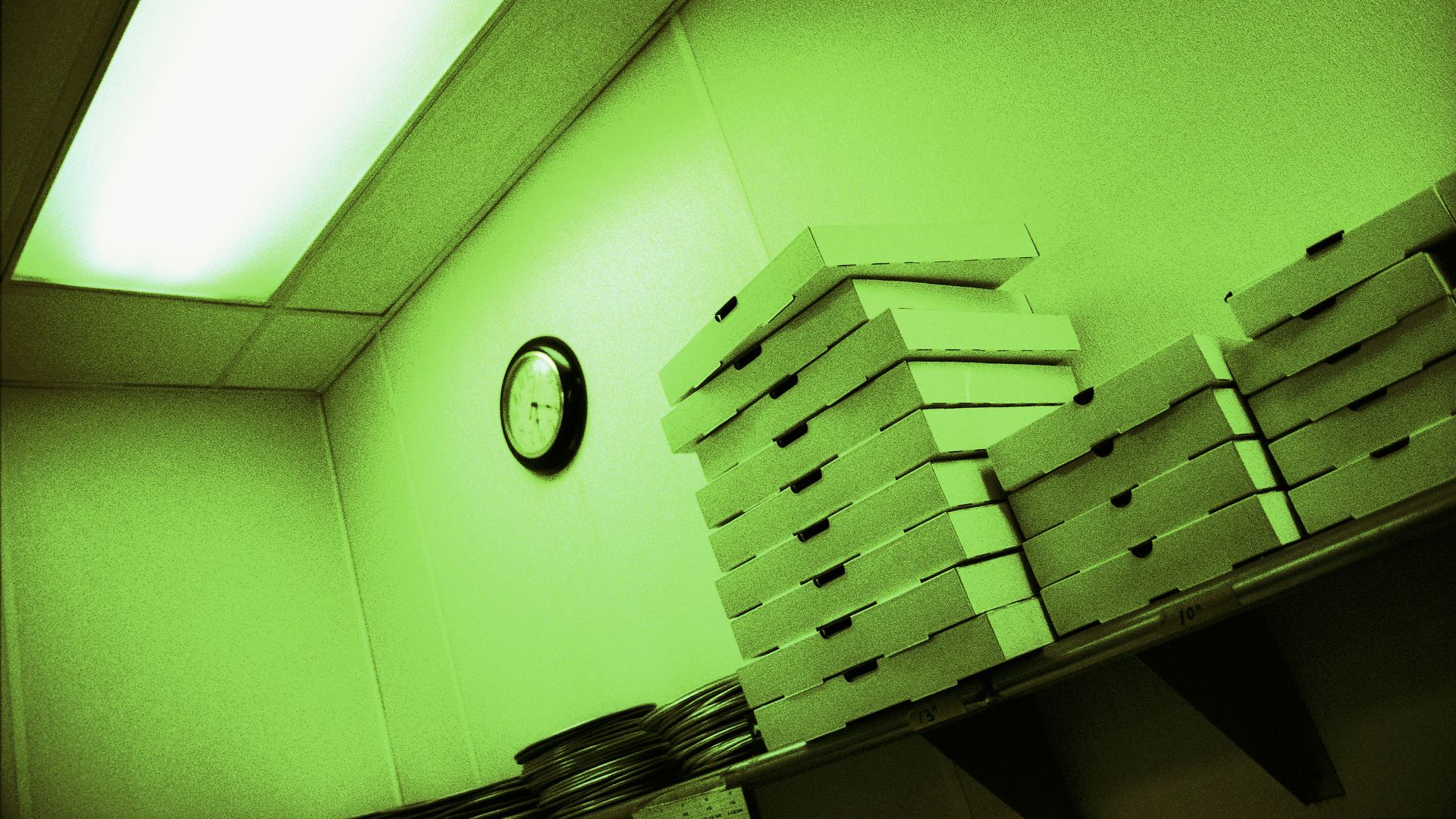 Stacked empty pizza boxes