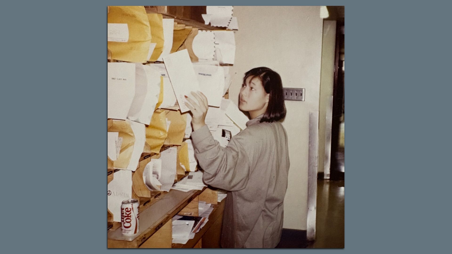 girl sorting mail