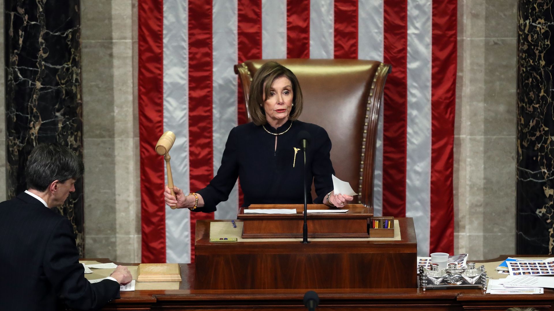 Nancy Pelosi presides over the impeachment proceedings