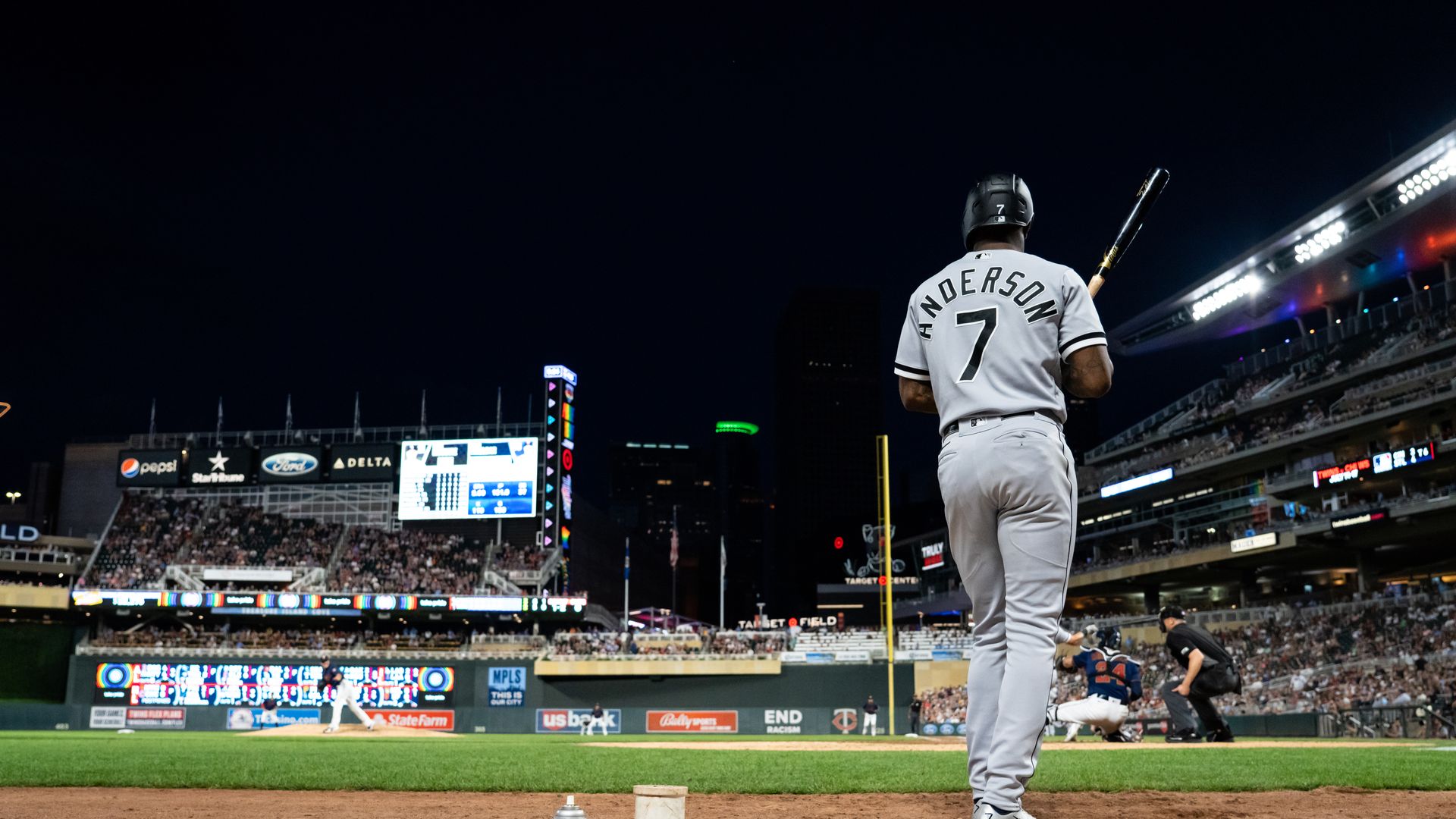Baseball player at the plate in a stadium