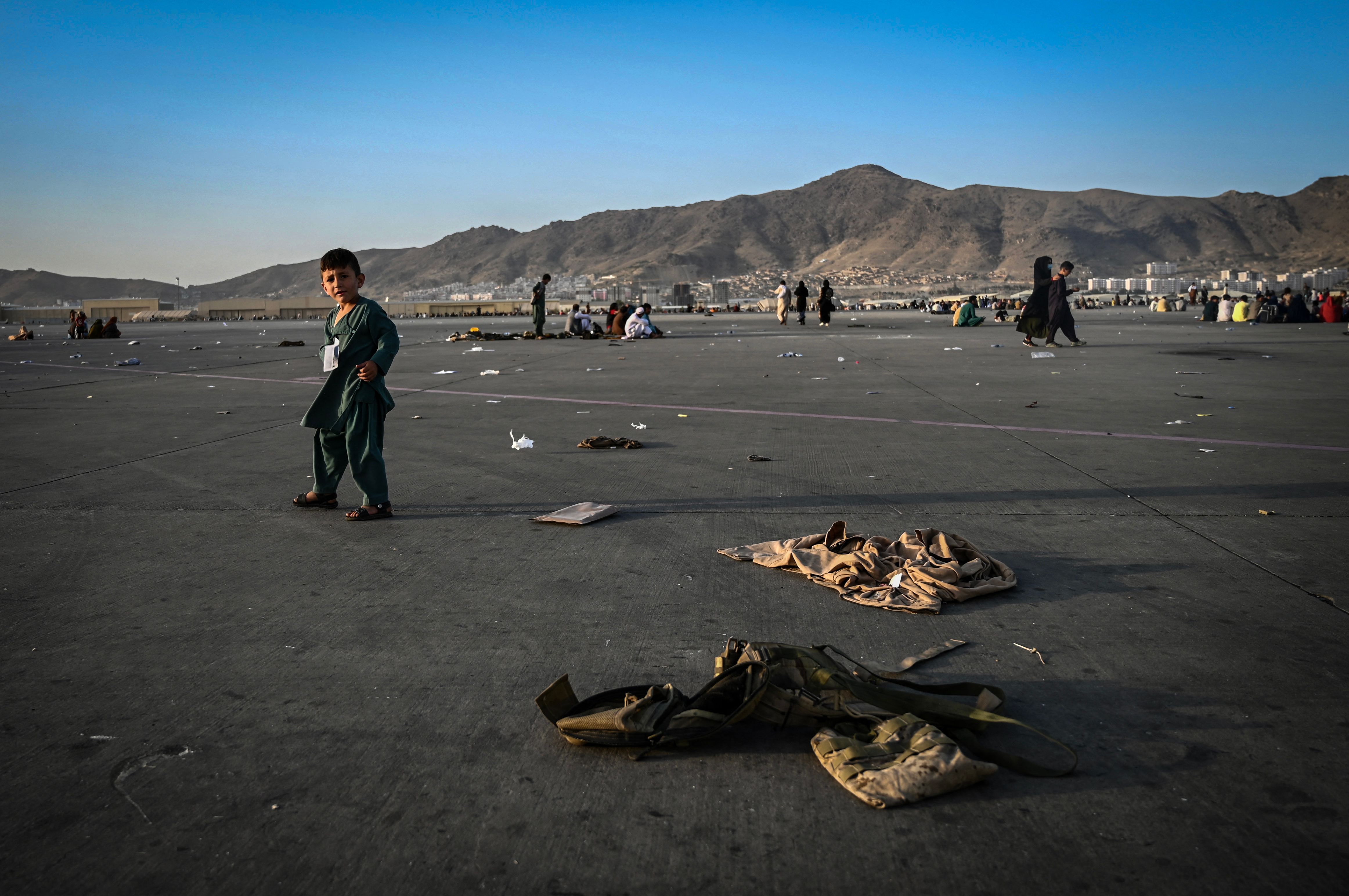 Afghan child on tarmac