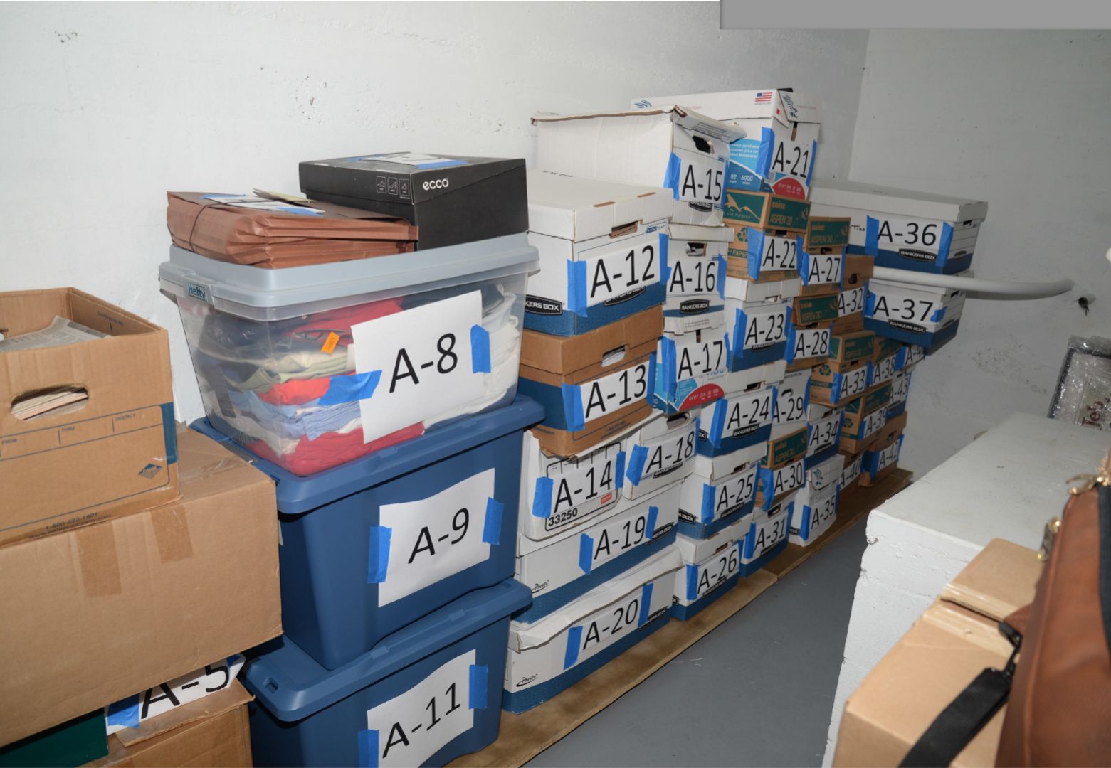 New photos released by prosecutors in former President Trump's classified documents case show papers and boxes labeled "secret" tucked away with holiday decorations, clothing items and magazines.