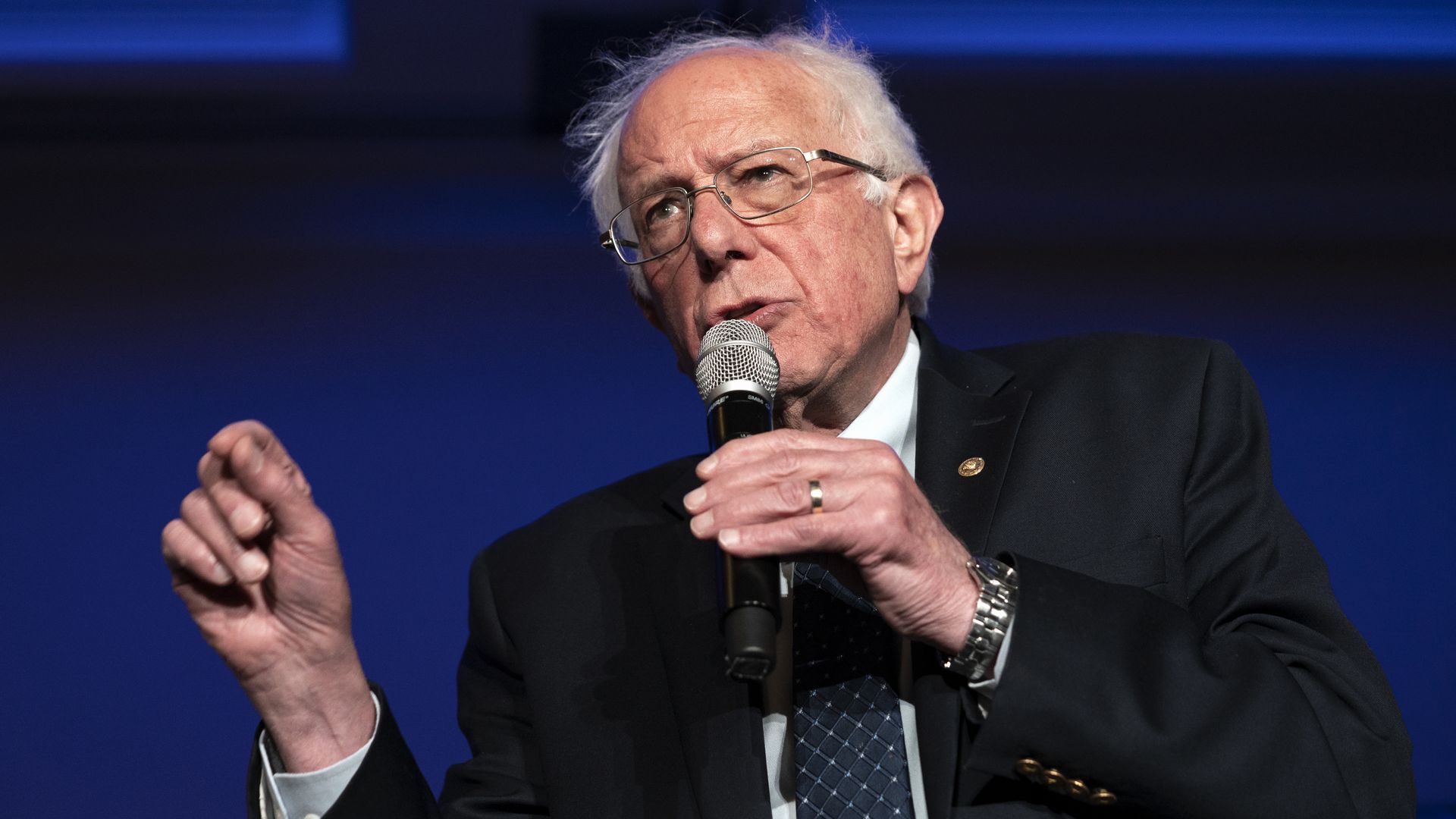 Senator and presidential candidate, Bernie Sanders, speaks while making a gesture during the Unity and Freedom Forum on immigration policy in Pasadena, California. 