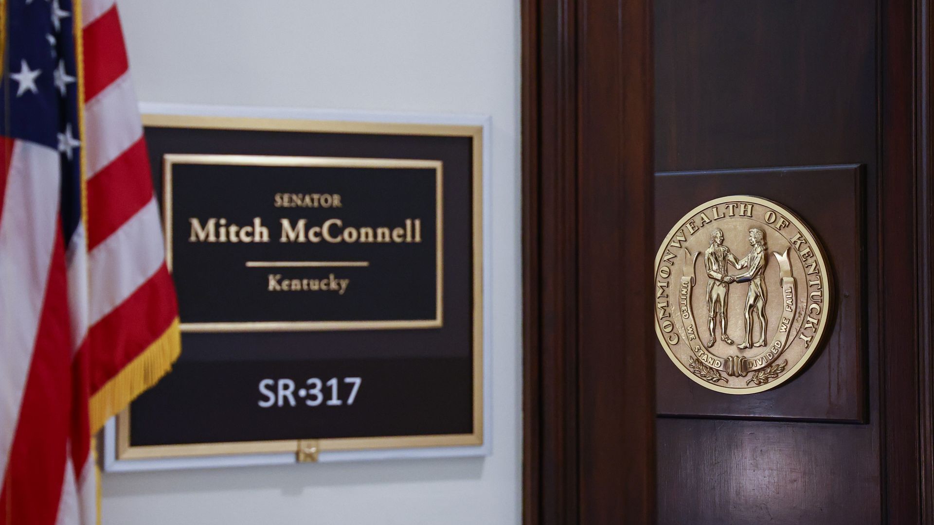 A plaque outside an office reads "SENATOR MITCH MCCONNELL KENTUCKY."