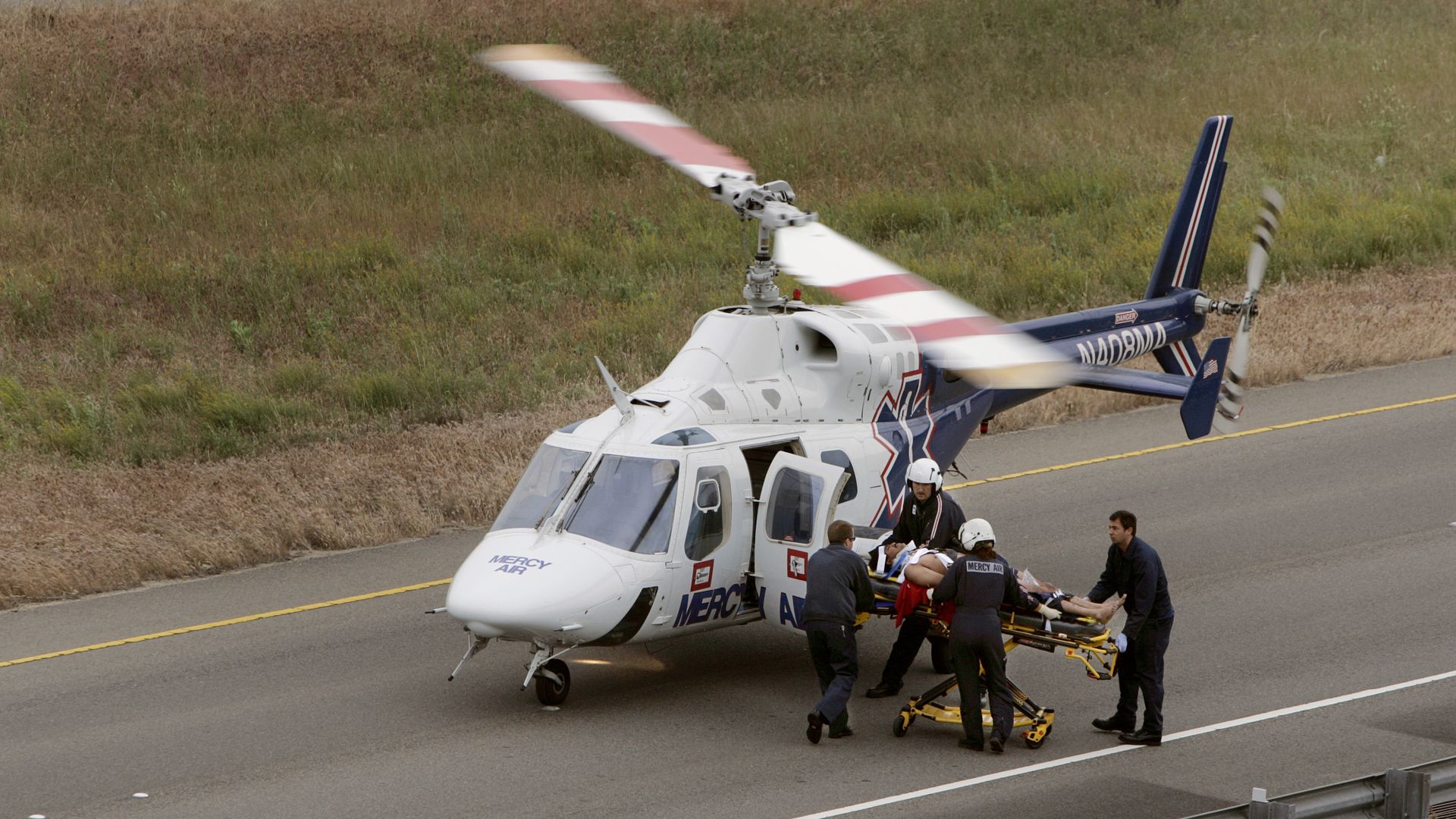 Crash victim being loaded into an air ambulance