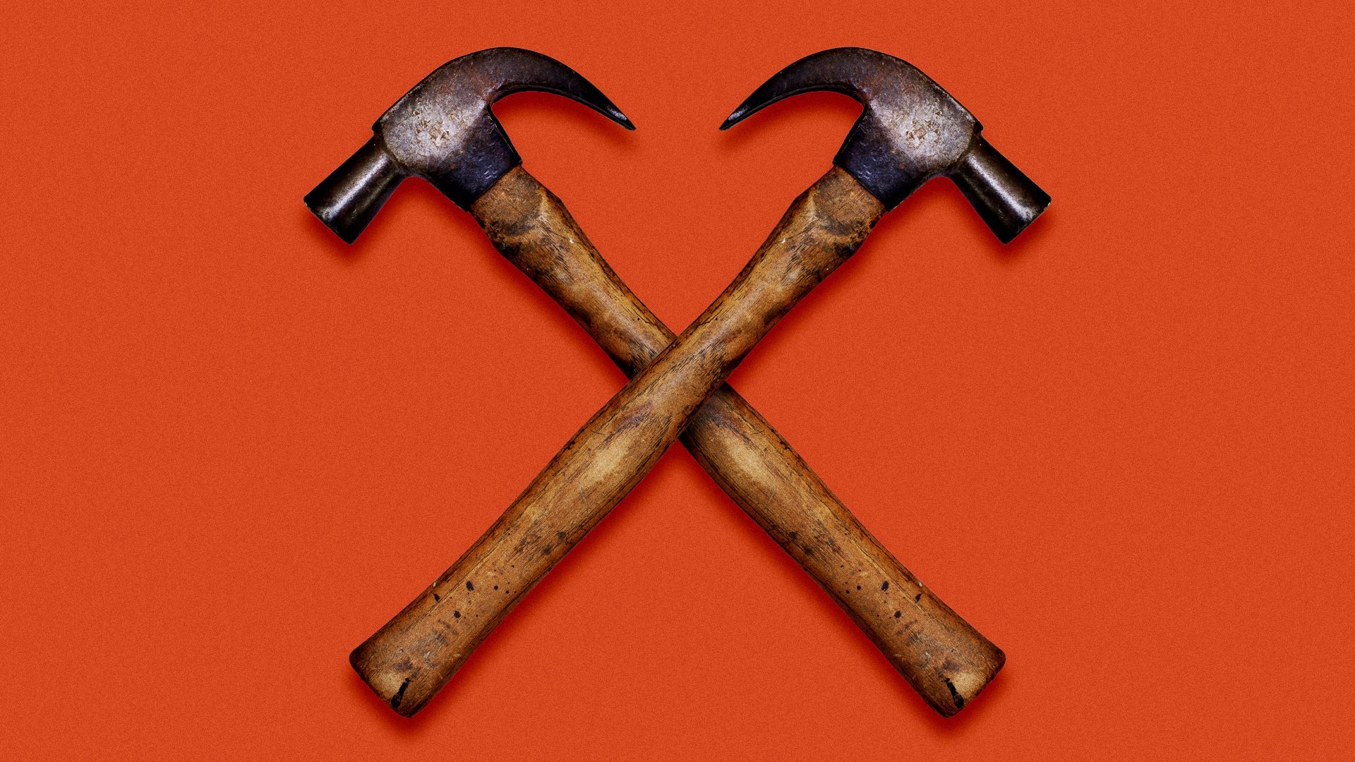 Illustration of two hammers forming an "X" shape. 