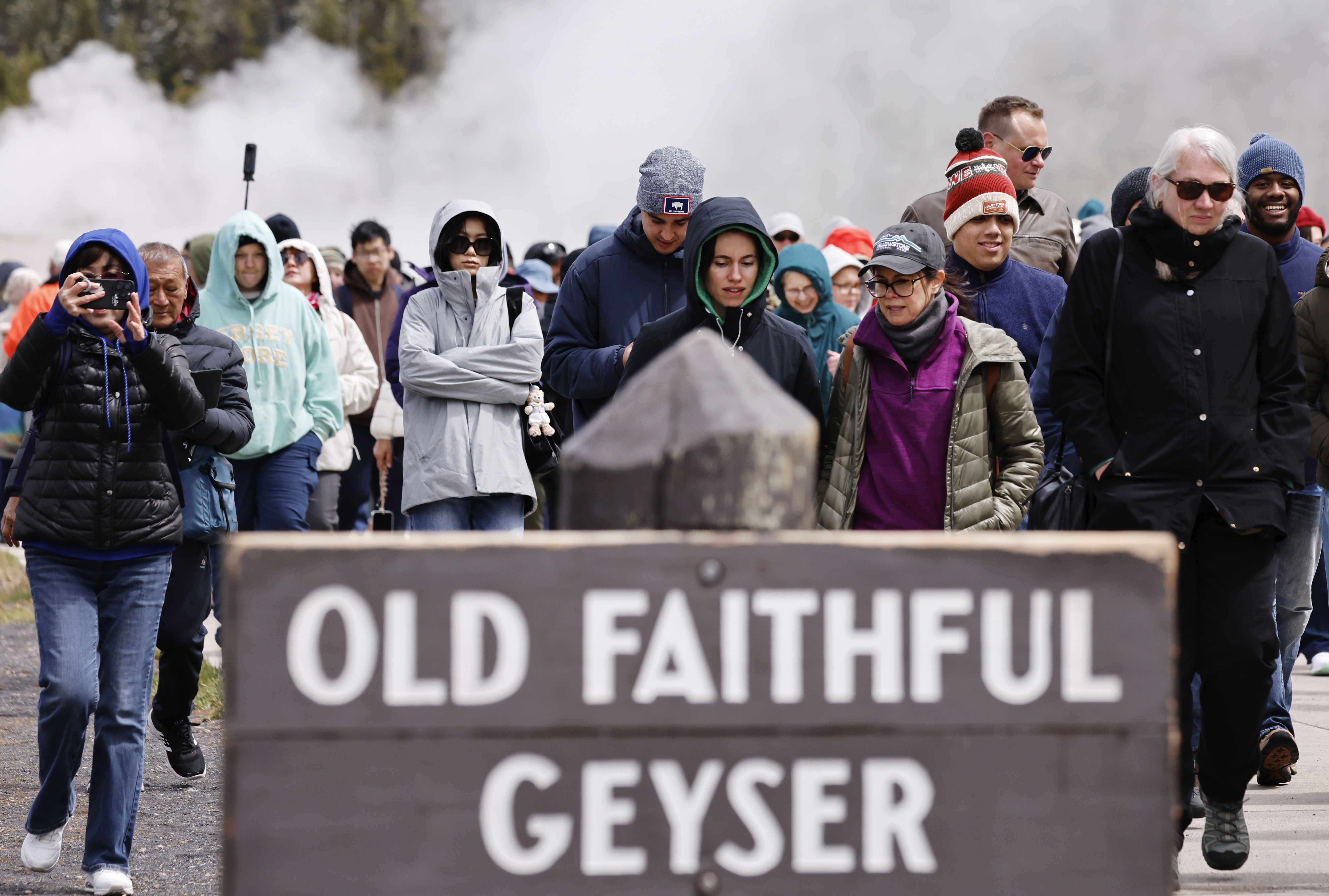 Visitors at Yellowstone National Park's Old Faithful geyser in May. Photo: Mario Tama/Getty Images