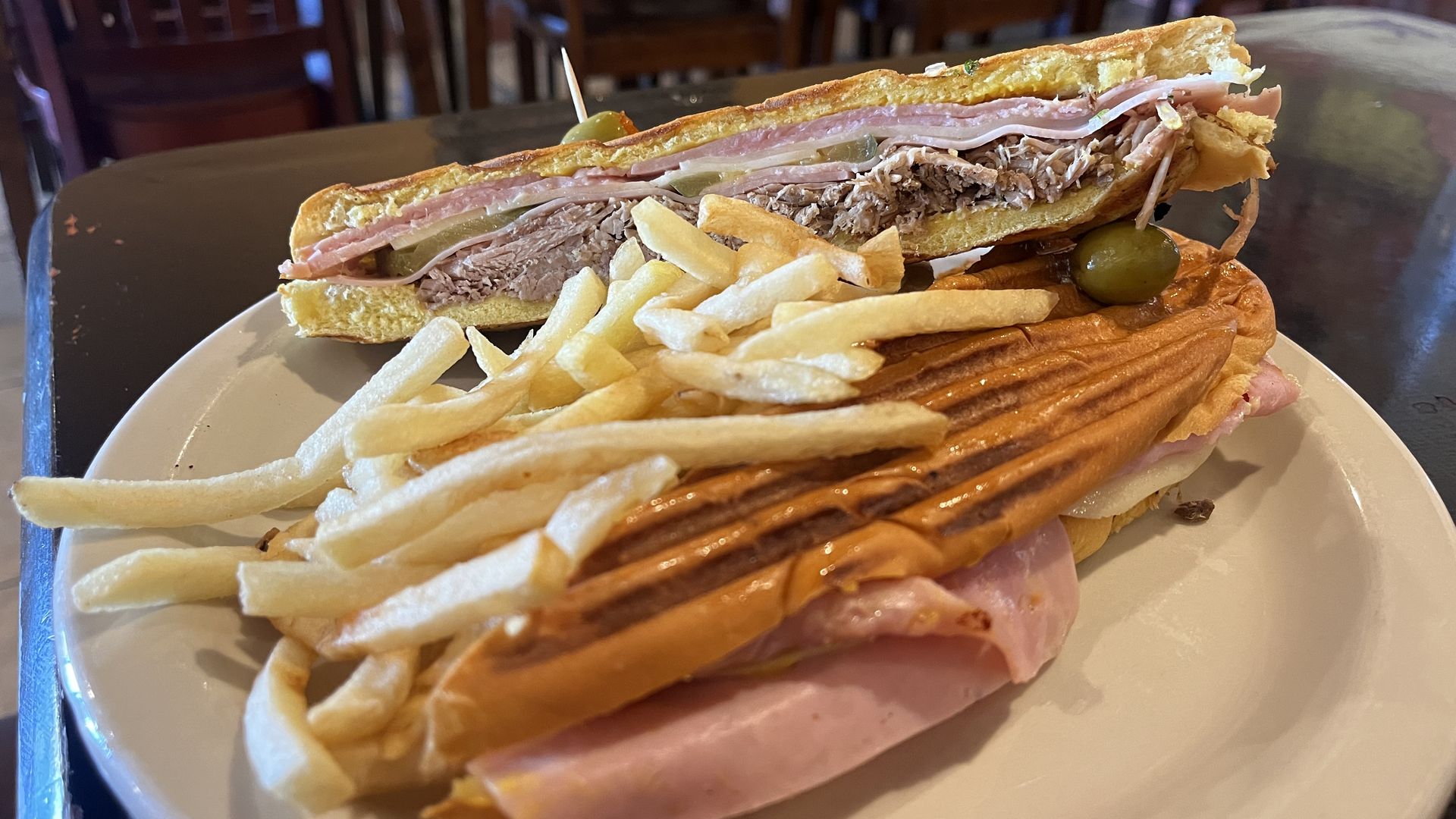 The Media Noche sandwich from Cuban Foods Bakery & Restaurant with fries.