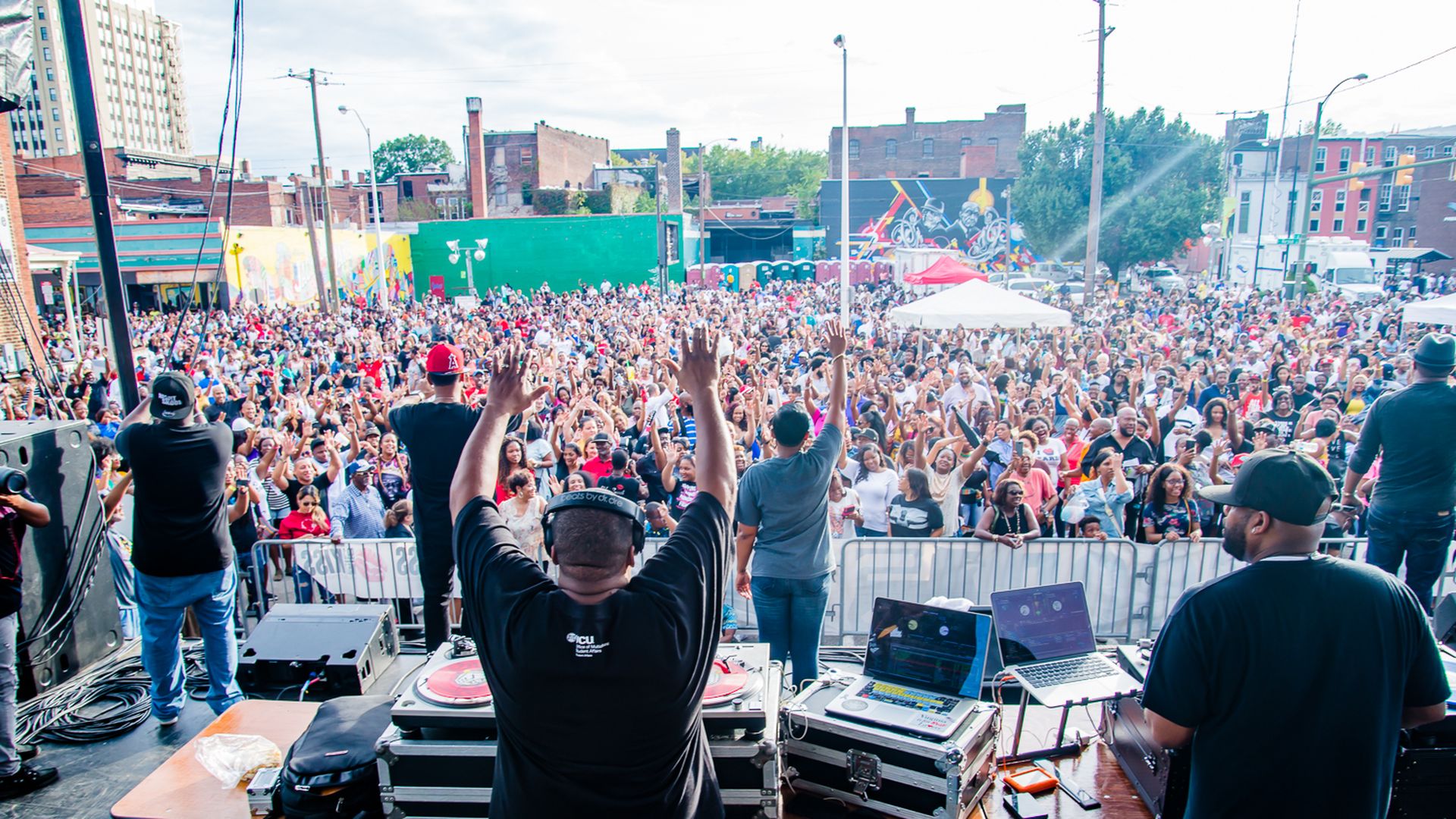a huge crowd of people in the street 