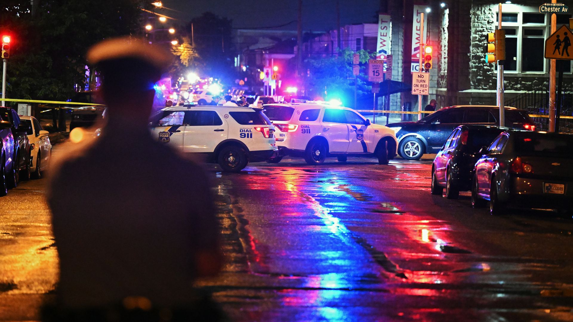 Police at the scene of a shooting that killed five people and injured two more in Philadelphia on July 3.