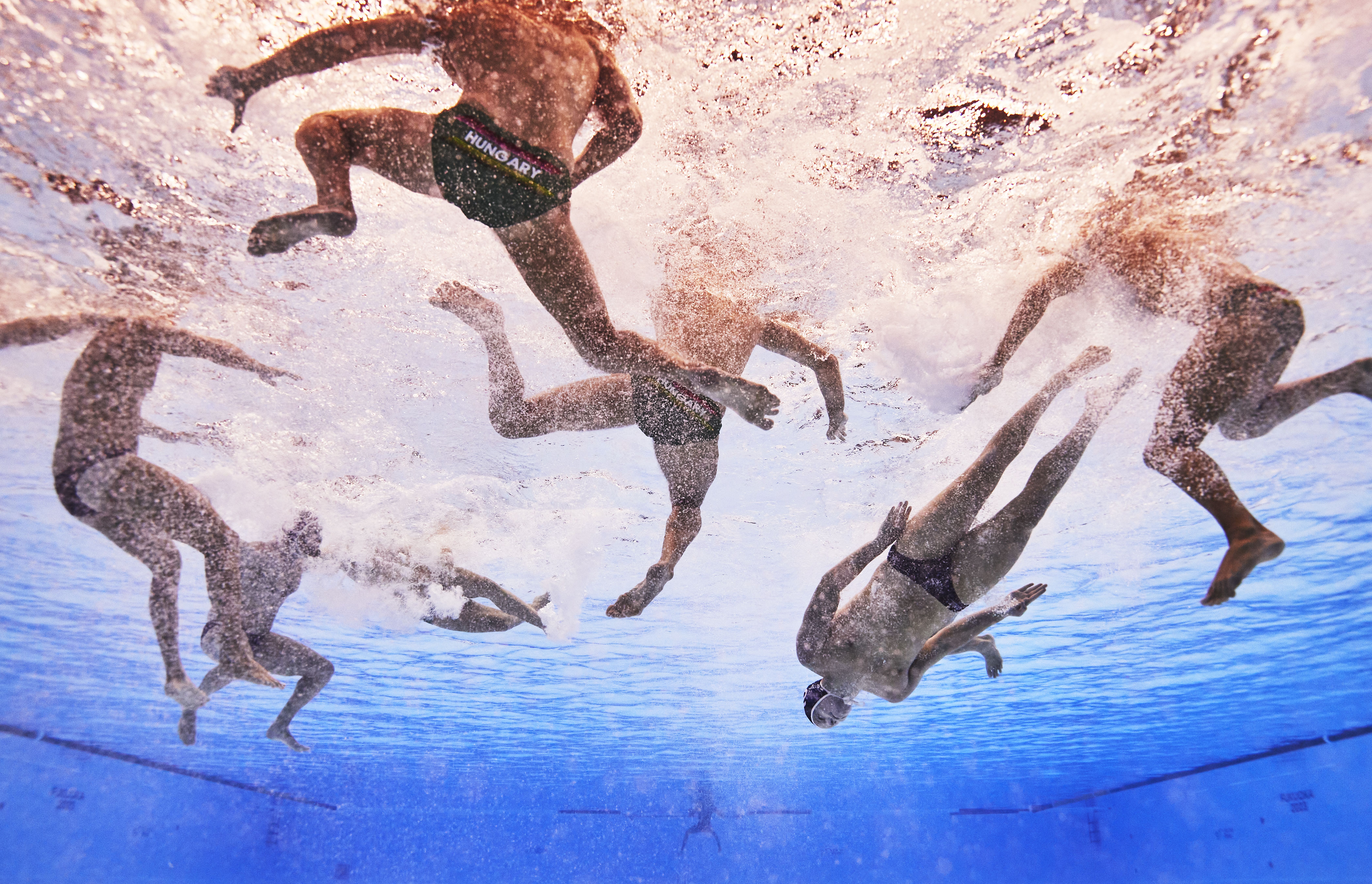 water polo players underwater