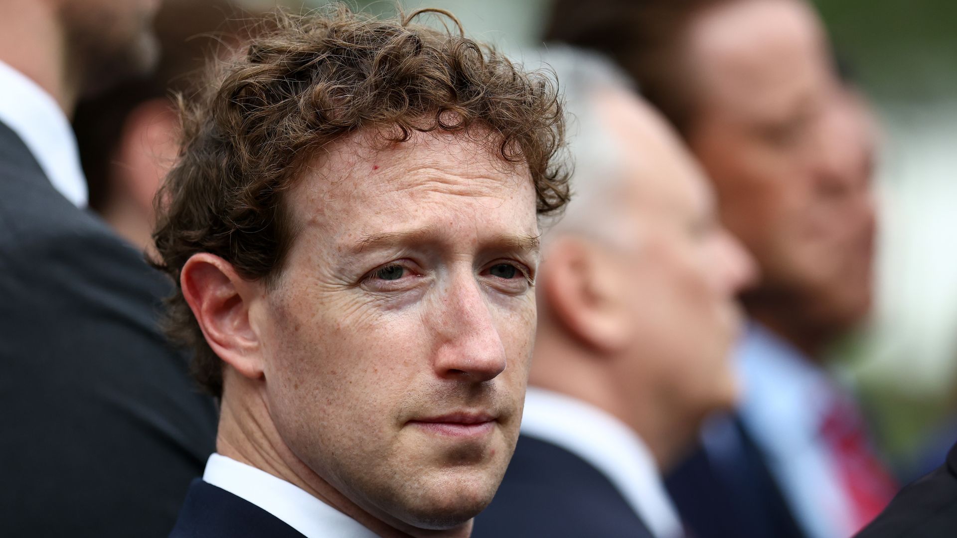 CEO of Meta Platforms Mark Zuckerberg looks on as U.S. President Donald Trump holds a press briefing with AI executives following a meeting on artificial intelligence, outside the West Wing of the White House on September 29, 2026 in Washington, DC.