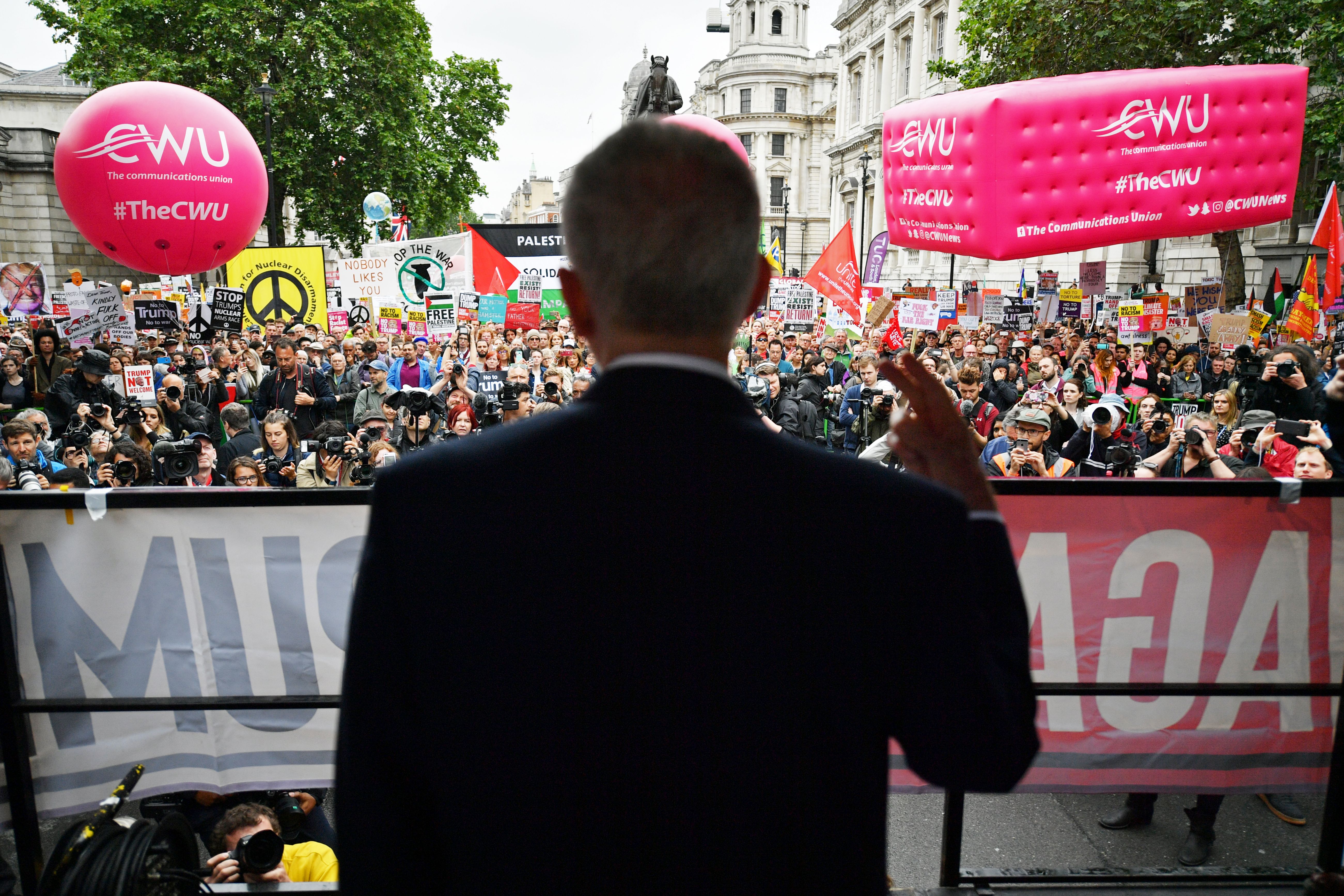 Labour party leader Jeremy Corbyn speaking on stage at an anti-Trump protest in Whitehall, London, on the second day of the state visit to the UK by US President Donald Trump. 