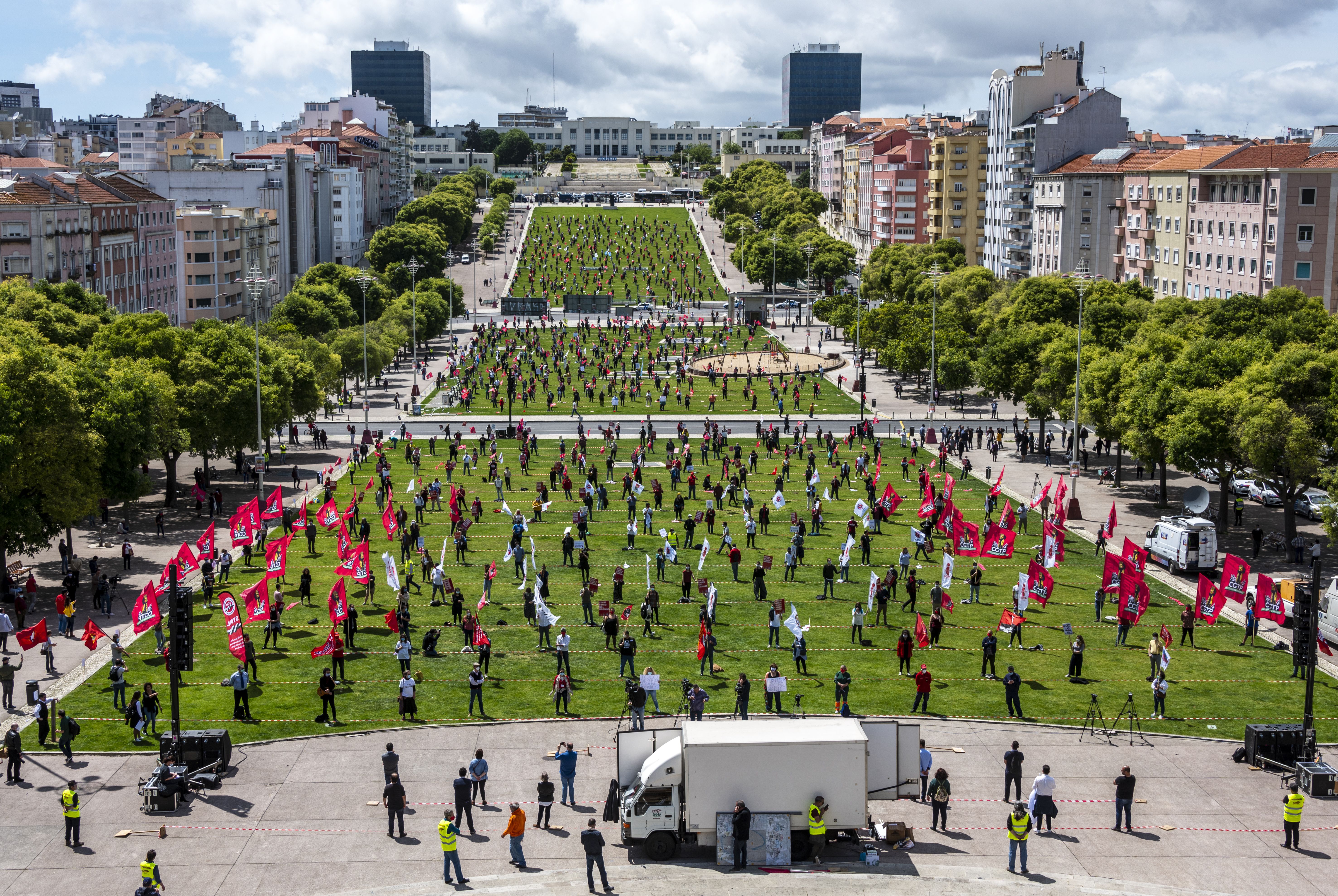 In photos: Protestors gather for International Workers' Day amid coronavirus pandemic