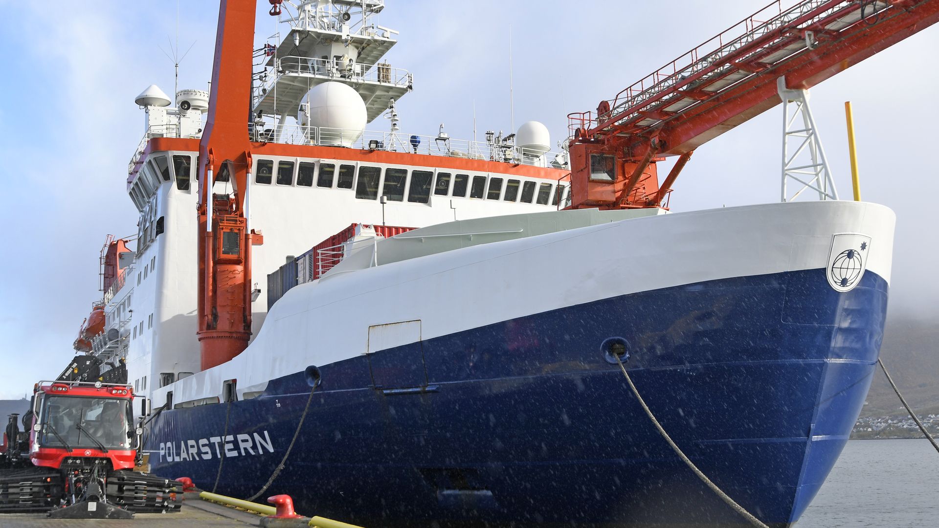 In this image, the research vessel Polarstern is docked and faces the camera nearly head on