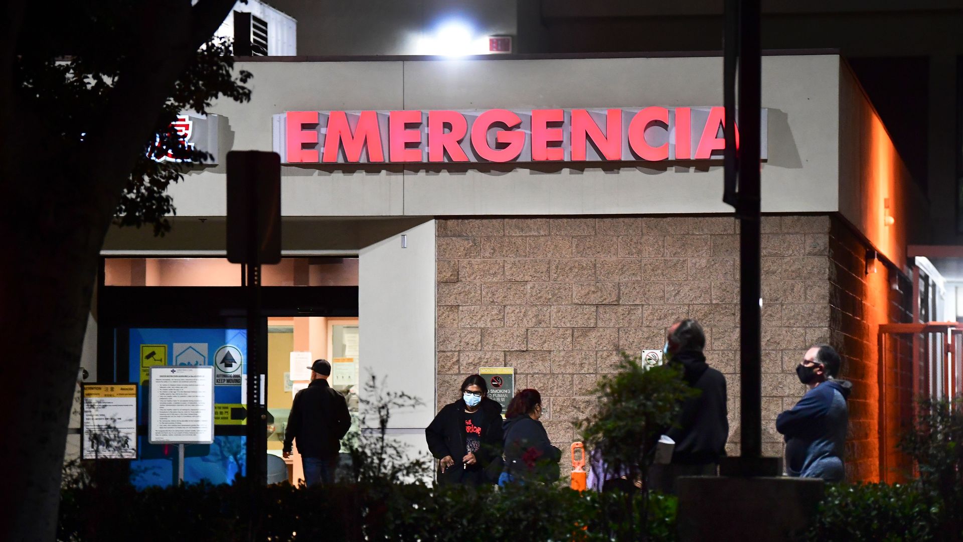 eople wait outside the Emergency room of the Garfield Medical Center in Monterey Park, California on December 1.
