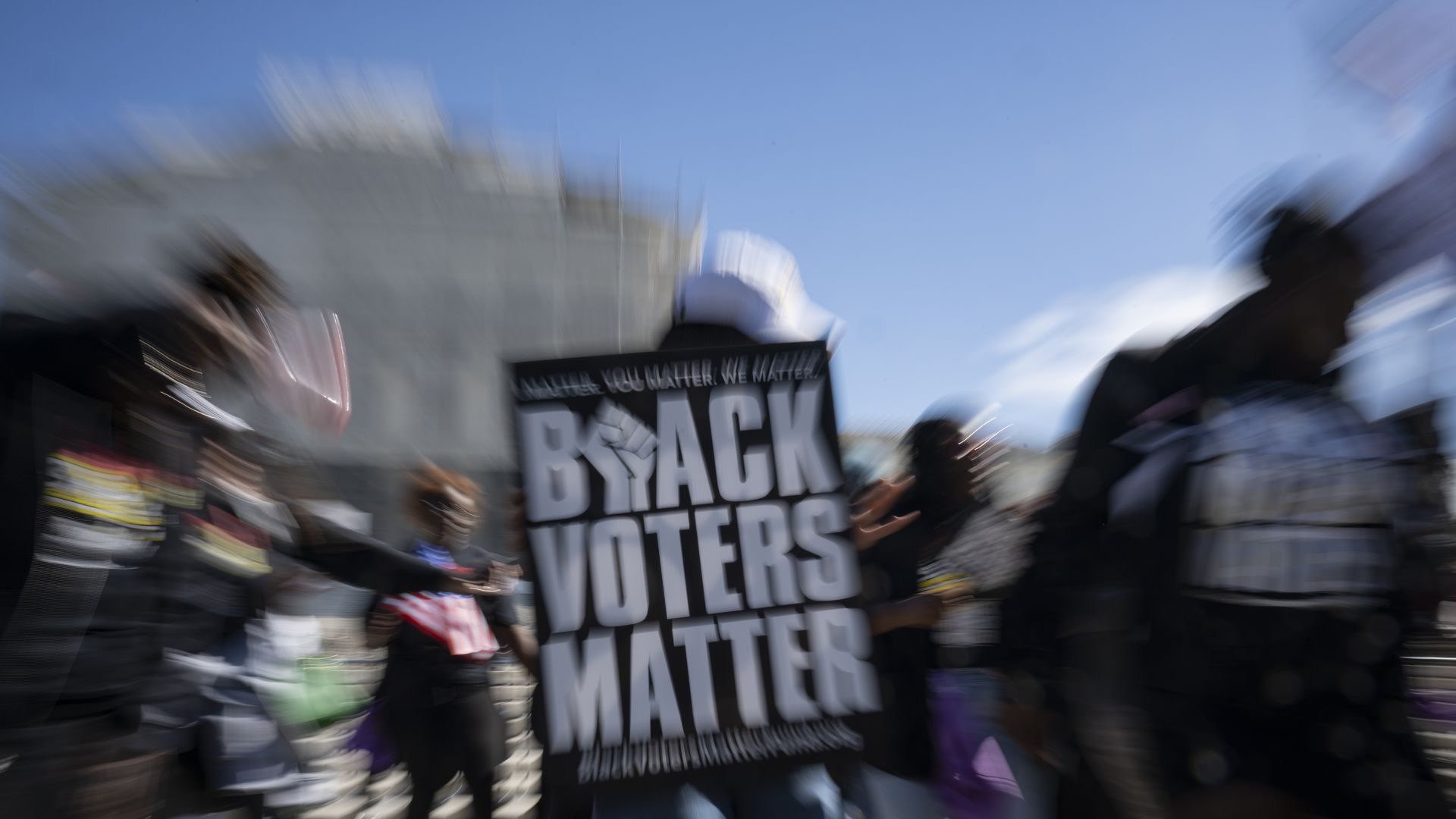 Demonstrators hold signs in support of voting rights outside the U.S. Supreme Court in Washington, D.C. Photo: Celal Gunes/Anadolu via Getty Images