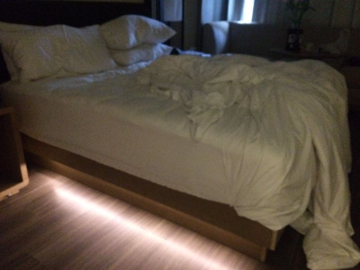 Motion sensored track lighting next to the bed