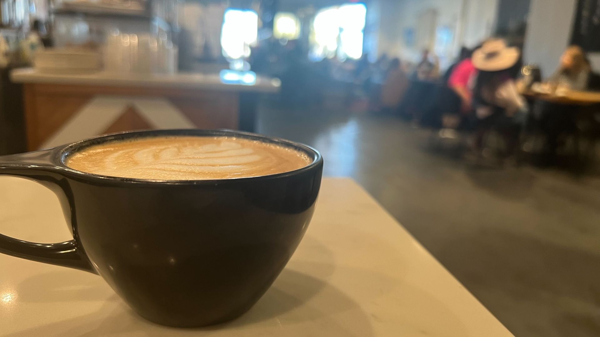 A photo of a latte on a table