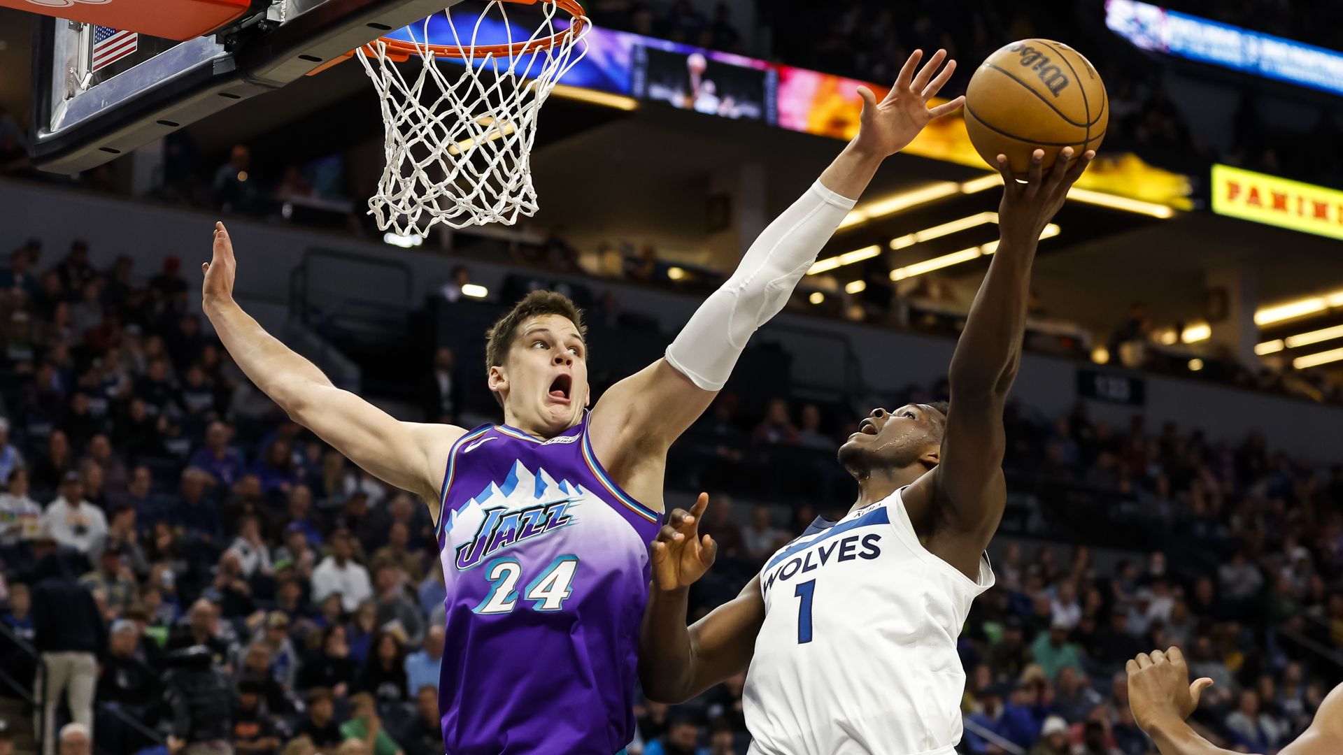 Walker Kessler goes up to block a shot from Anthony Edwards