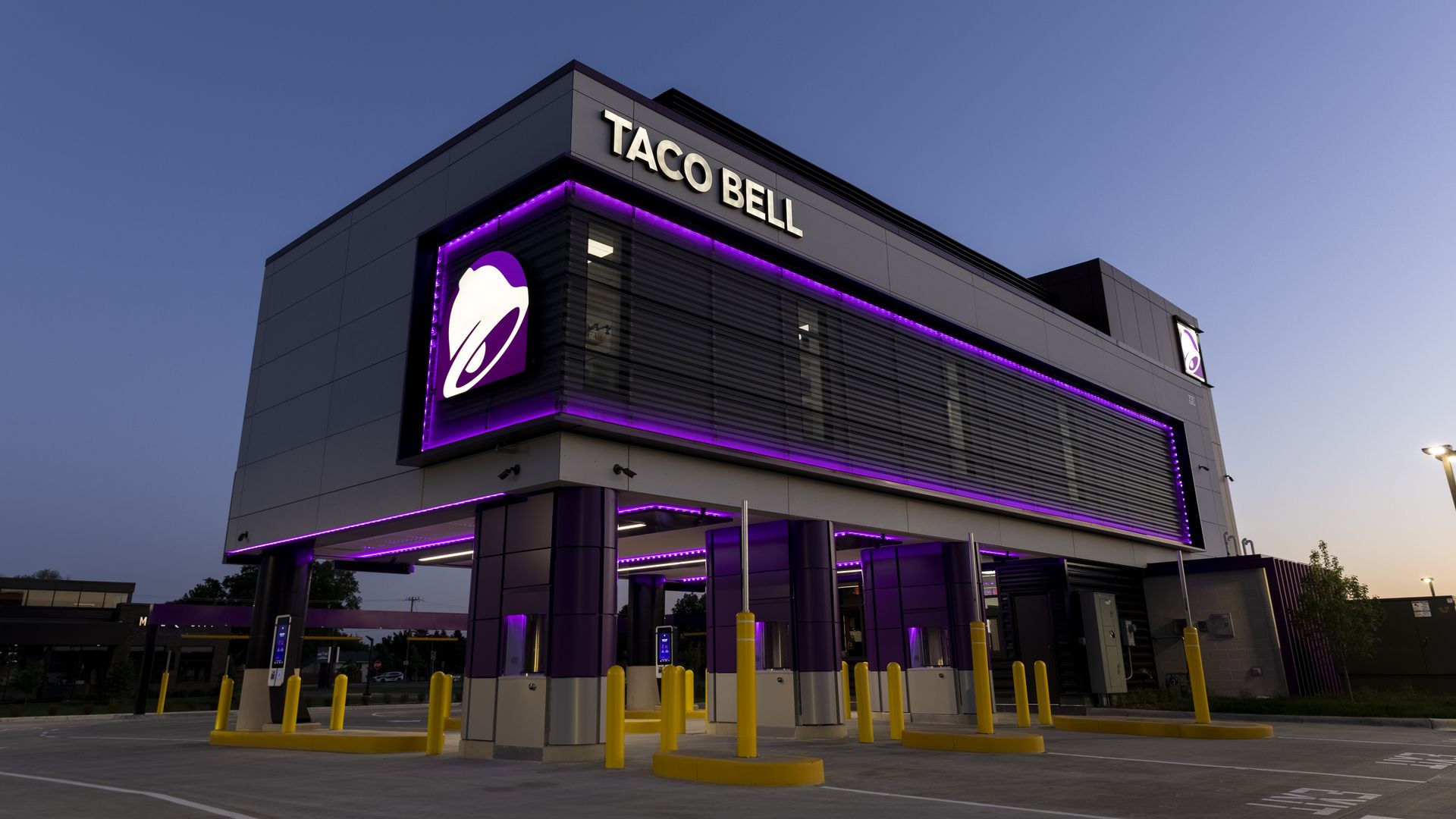 Taco Bell restaurant with four drive-thru lanes