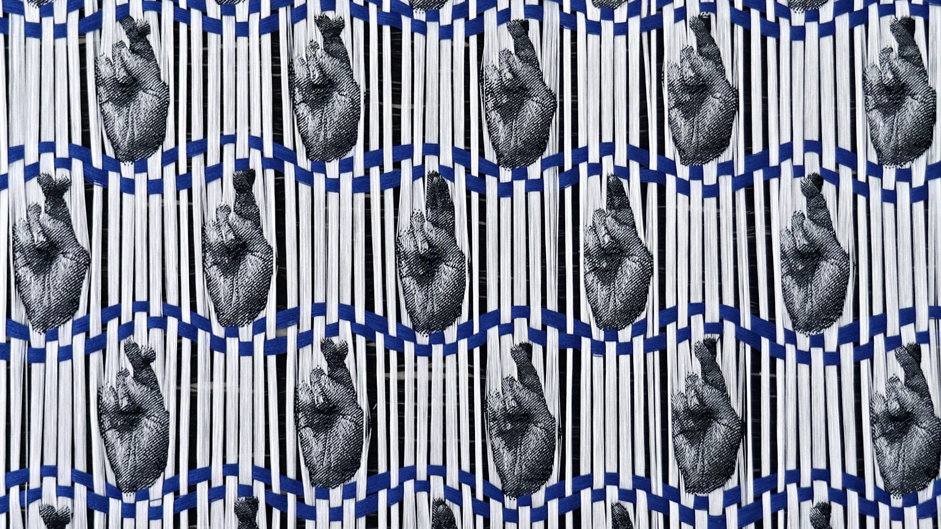 Kate Nartker (Durham, NC, 1979‑). Fingers Crossed, 2022, handwoven jacquard weaving. Courtesy the artist.